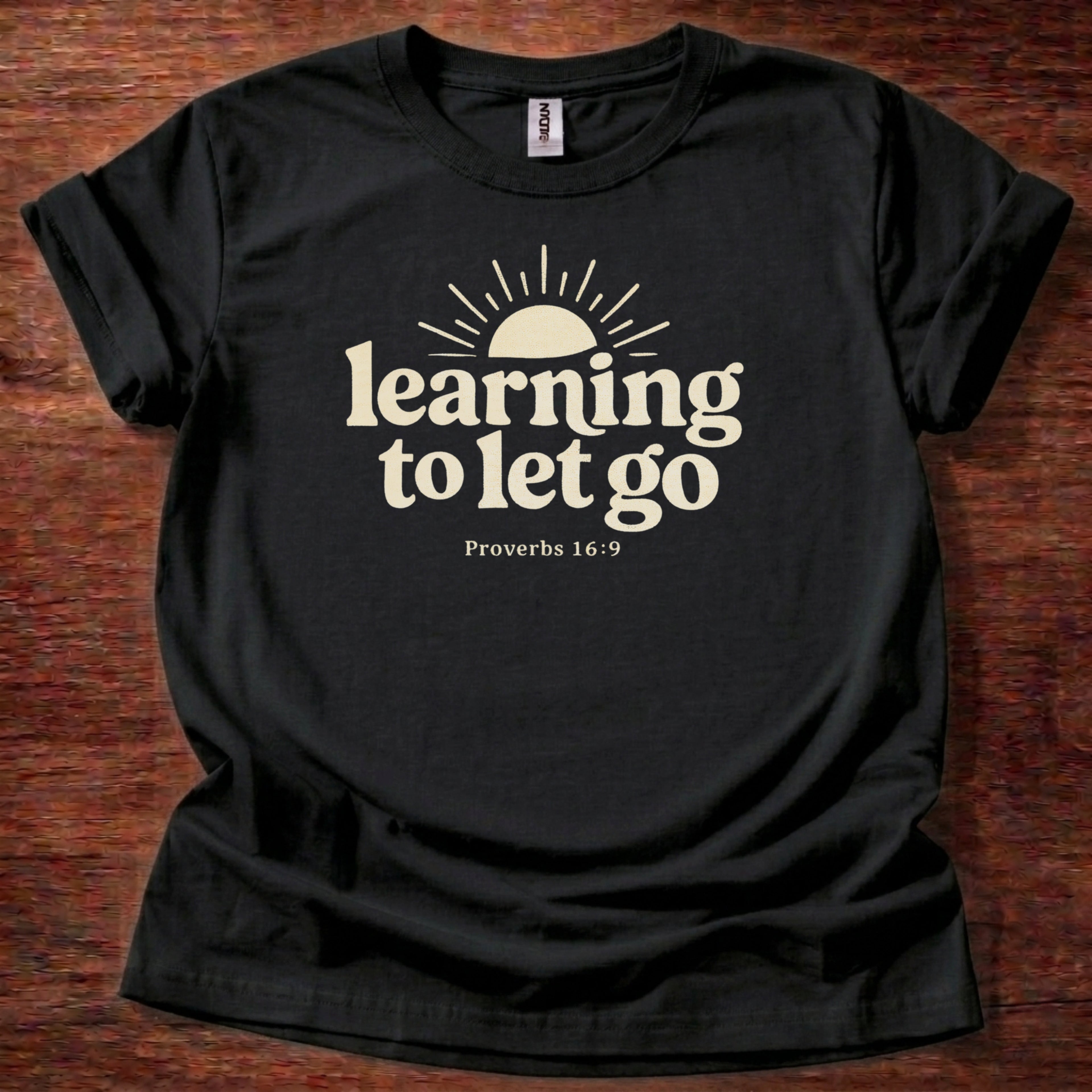 Learning to let go T-Shirt