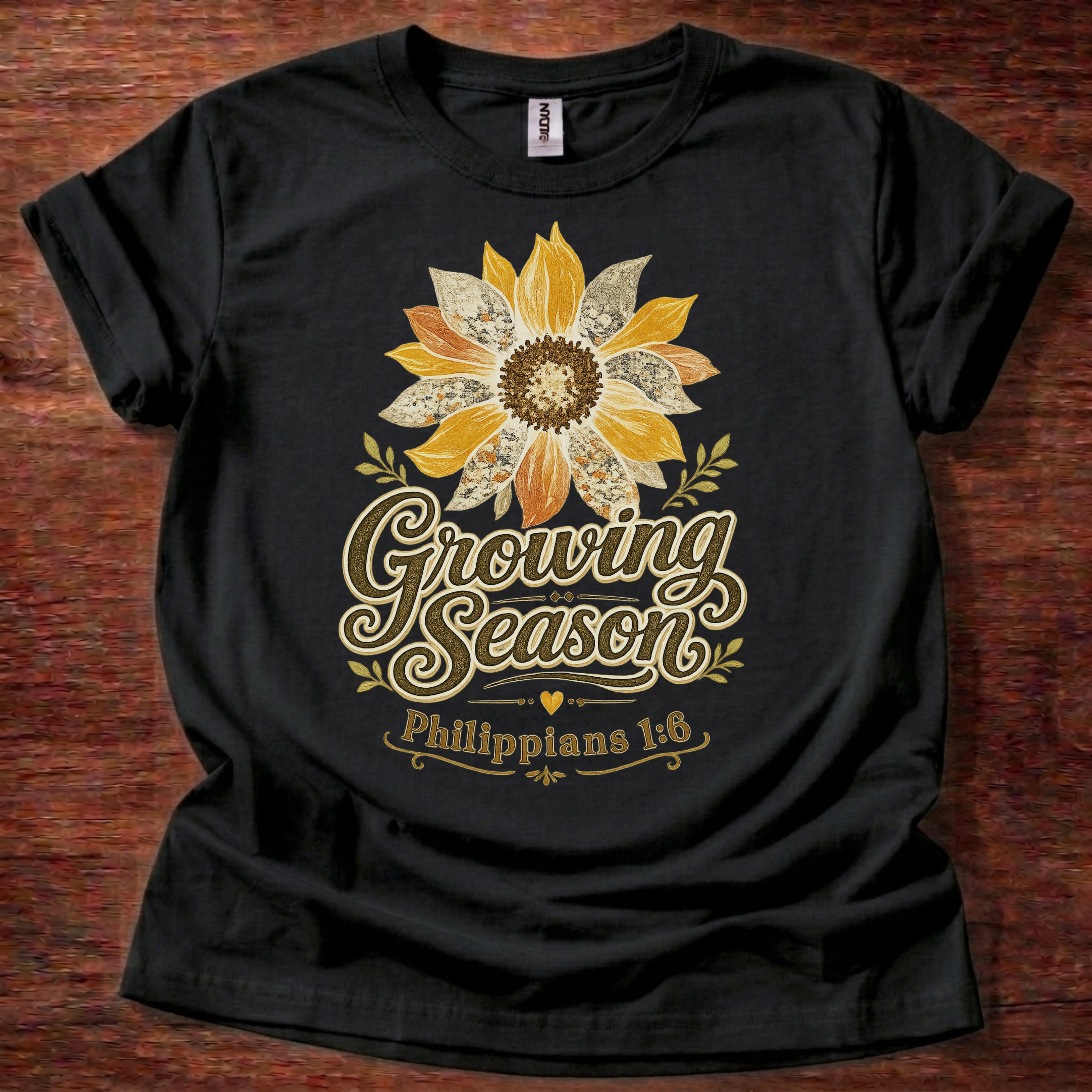 Black Growing Season Christian t-shirt with sunflower graphic and Philippians 1:6 scripture design