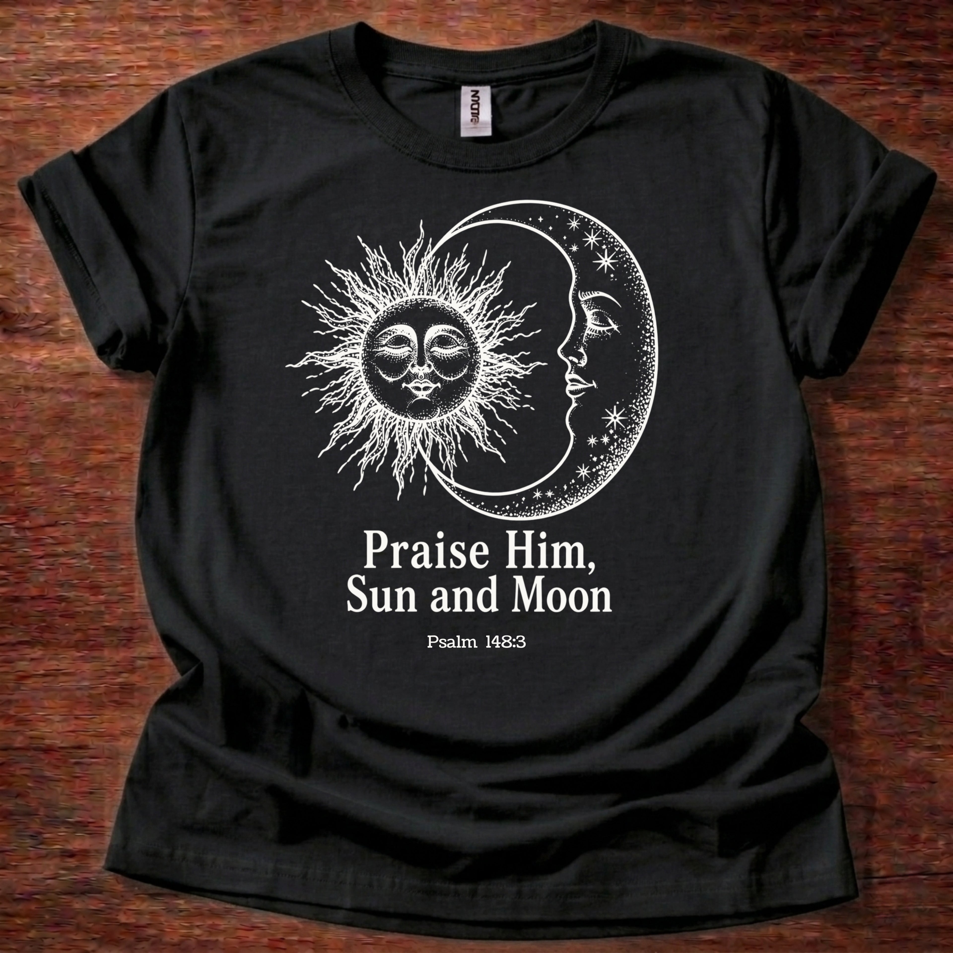 Black t-shirt featuring a sun and moon celestial design with the text “Praise Him, Sun and Moon Psalm 148:3” printed on the front
