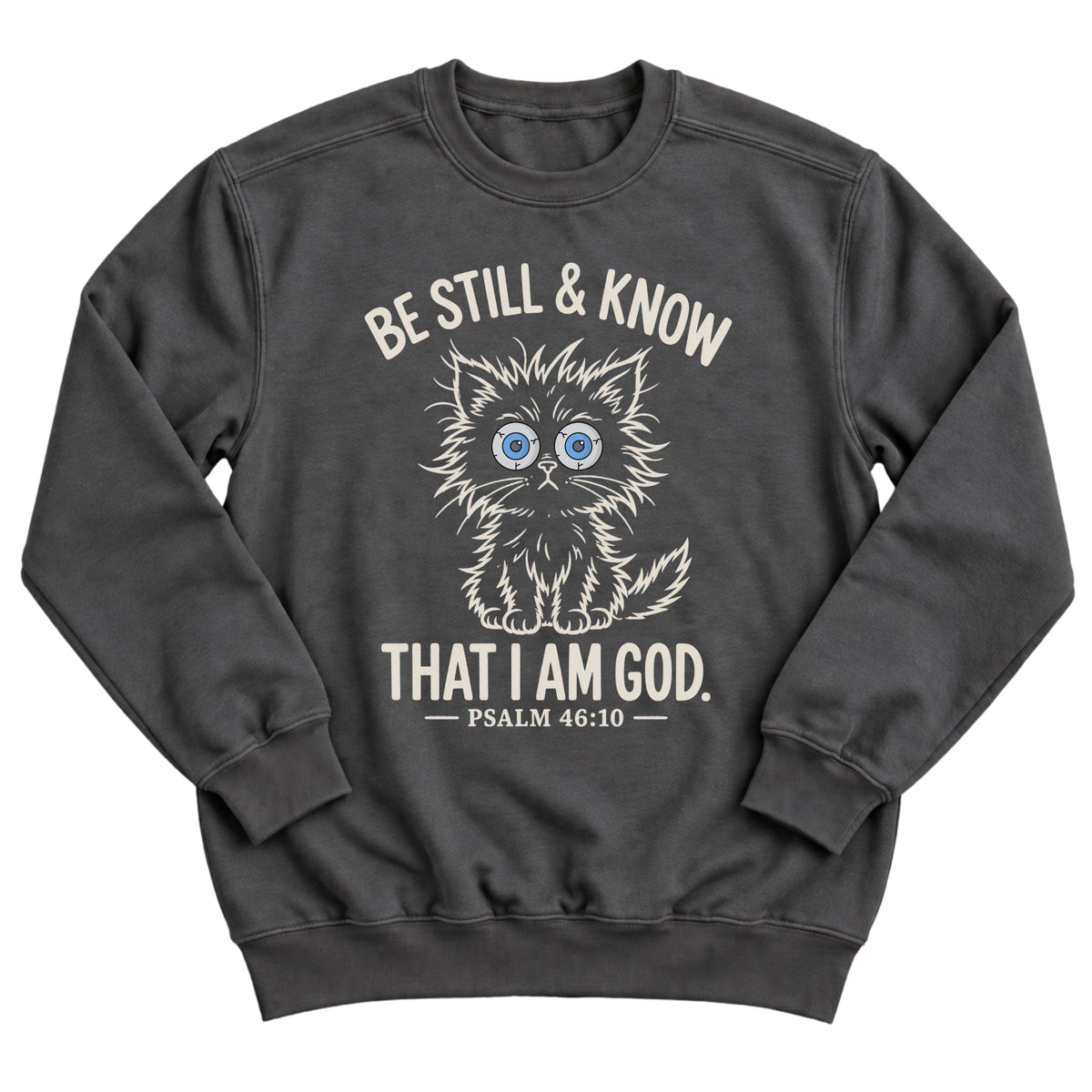 Charcoal crewneck sweatshirt with a wide-eyed fluffy kitten illustration and the words Be Still & Know That I Am God, Psalm 46:10