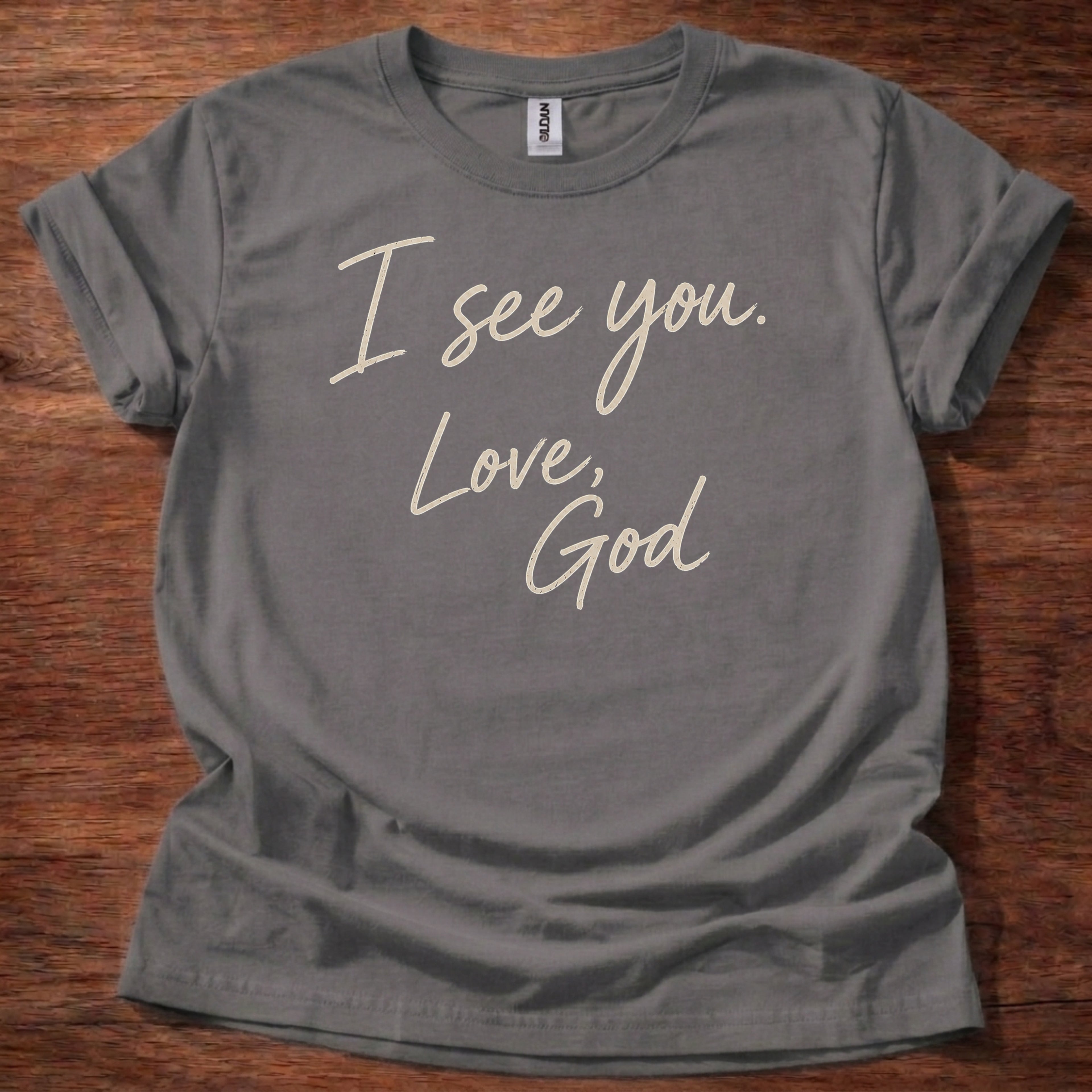 Charcoal Christian t-shirt with handwritten text reading I see you Love God