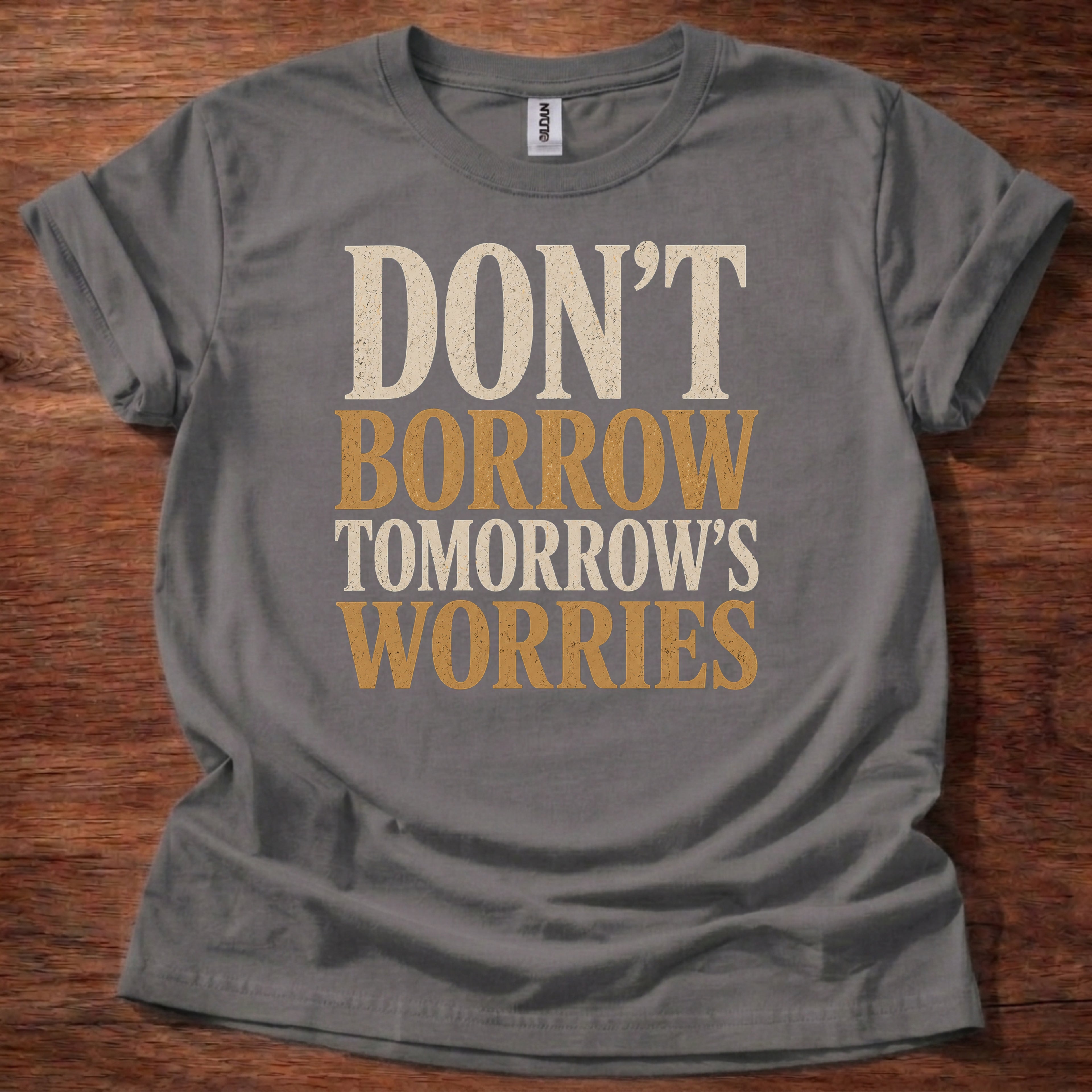 Charcoal Don’t Borrow Tomorrow’s Worries Christian shirt with bold vintage typography design on navy background, Matthew 6:34 inspired faith tee