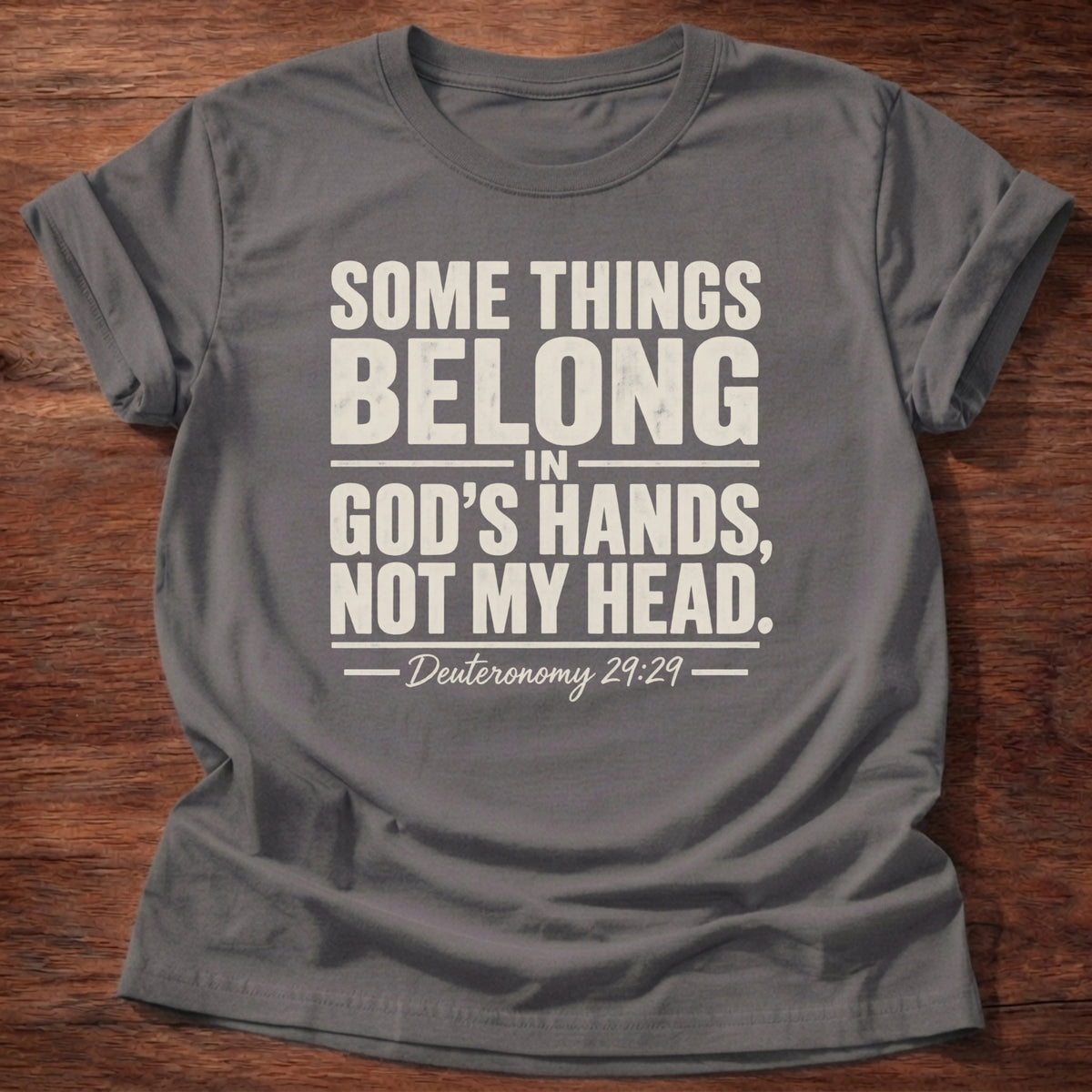 Charcoal t-shirt with 'Some things belong in God's hands, not my head' typography, a grounding overthinker tee