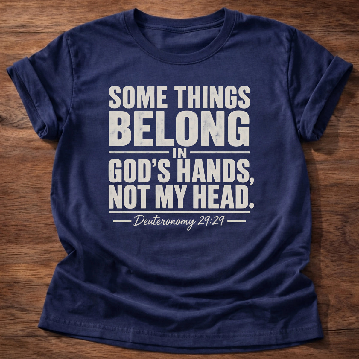 Navy t-shirt printed with 'Some things belong in God's hands, not my head,' faith based mental redirects tee