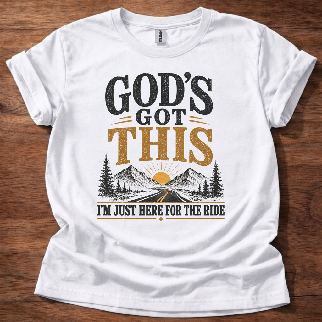 God’s Got This I’m Just Here for the Ride Christian shirt with mountain and sunrise graphic on beige t-shirt, inspirational faith design