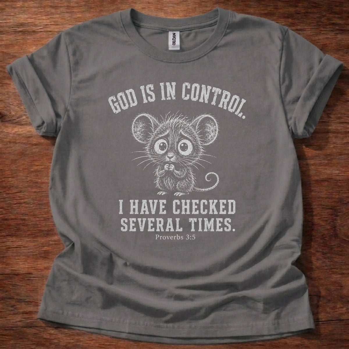 White fine-line mouse illustration t-shirt with the text 'God Is In Control. I Have Checked Several Times.' and Proverbs 3:5