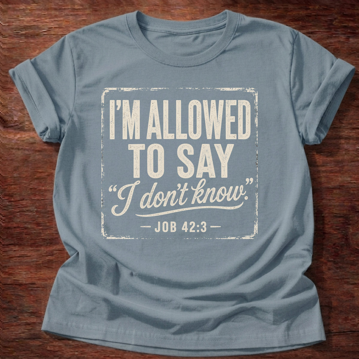 Stone blue t-shirt reading 'I'm allowed to say I don't know' Job 42:3, an honest minimalist Christian shirt