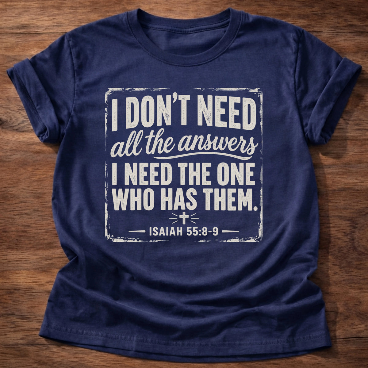 Navy t-shirt printed with 'I don't need all the answers. I need the One who has them,' faith based grounding tee