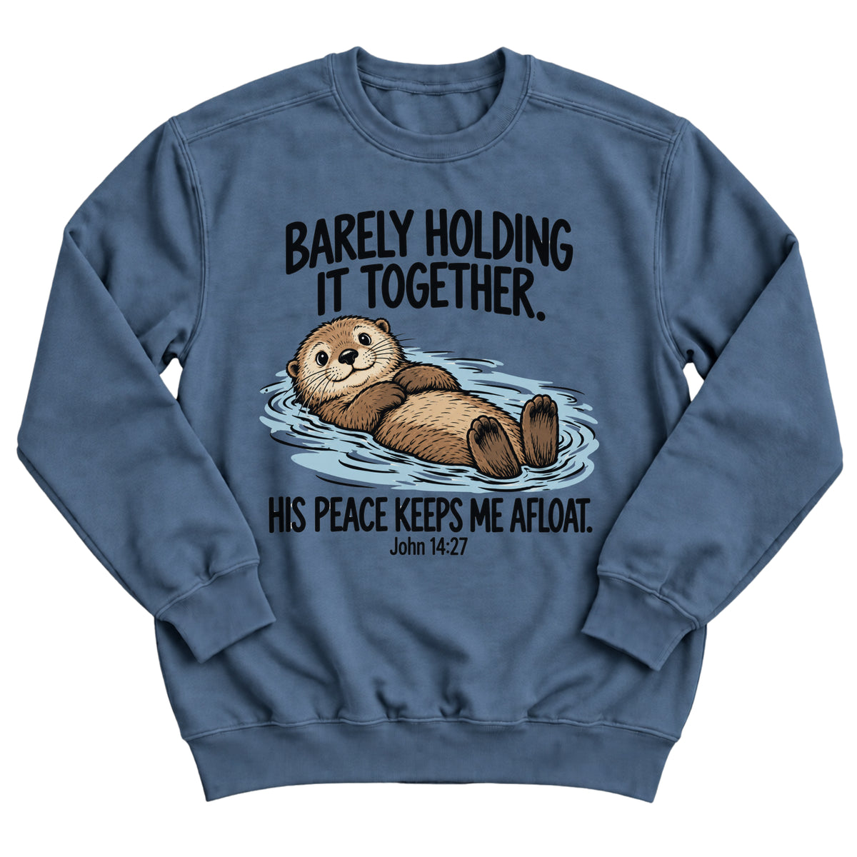 Indigo blue crewneck sweatshirt with a smiling otter floating on its back in the water with the words Barely Holding It Together. His Peace Keeps Me Afloat. John 14:27
