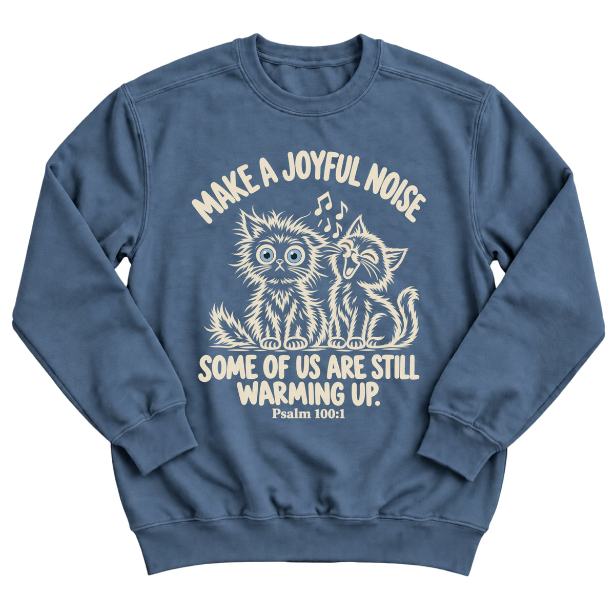Indigo blue crewneck sweatshirt with two fluffy cats, one singing with music notes and one wide-eyed, with the words Make A Joyful Noise. Some Of Us Are Still Warming Up. Psalm 100:1