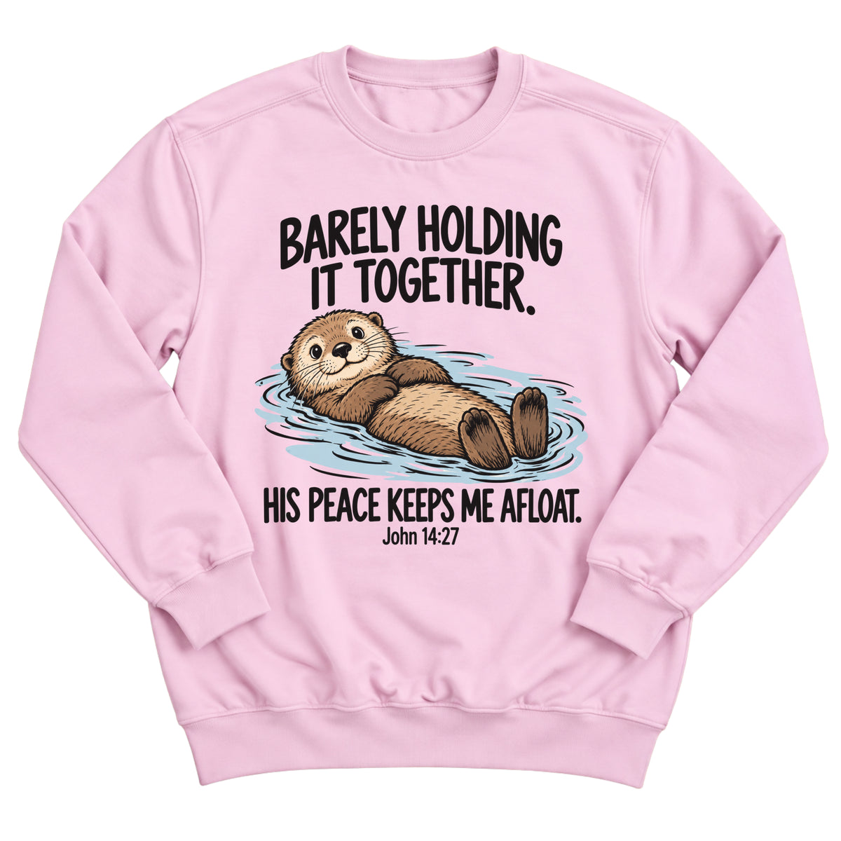 Light pink crewneck sweatshirt with a smiling otter floating on its back in the water with the words Barely Holding It Together. His Peace Keeps Me Afloat. John 14:27