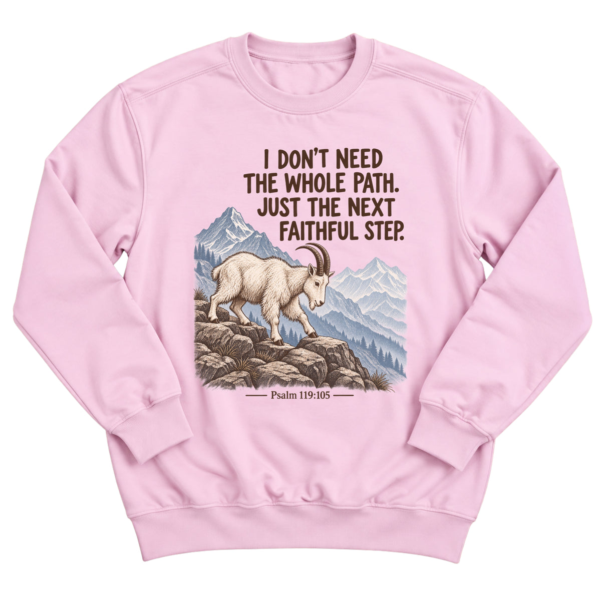 Light pink crewneck sweatshirt with a mountain goat climbing rocky slopes in front of blue mountains with the words I Don't Need The Whole Path. Just The Next Faithful Step. Psalm 119:105