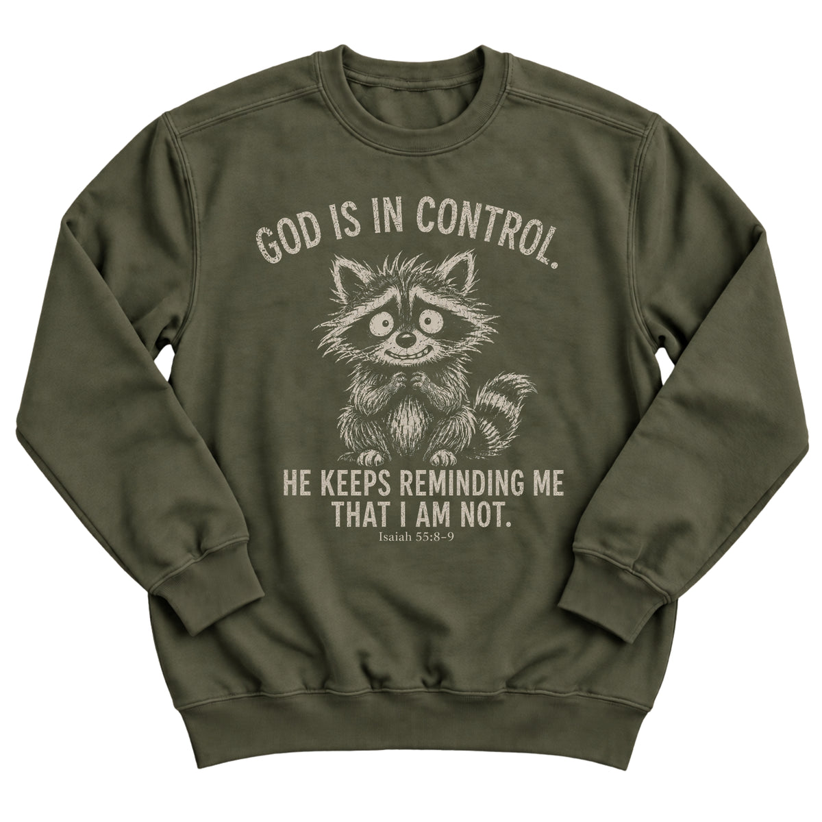 Military green crewneck sweatshirt with a nervous, wide-eyed raccoon illustration and the words God Is In Control. He Keeps Reminding Me That I Am Not. Isaiah 55:8-9