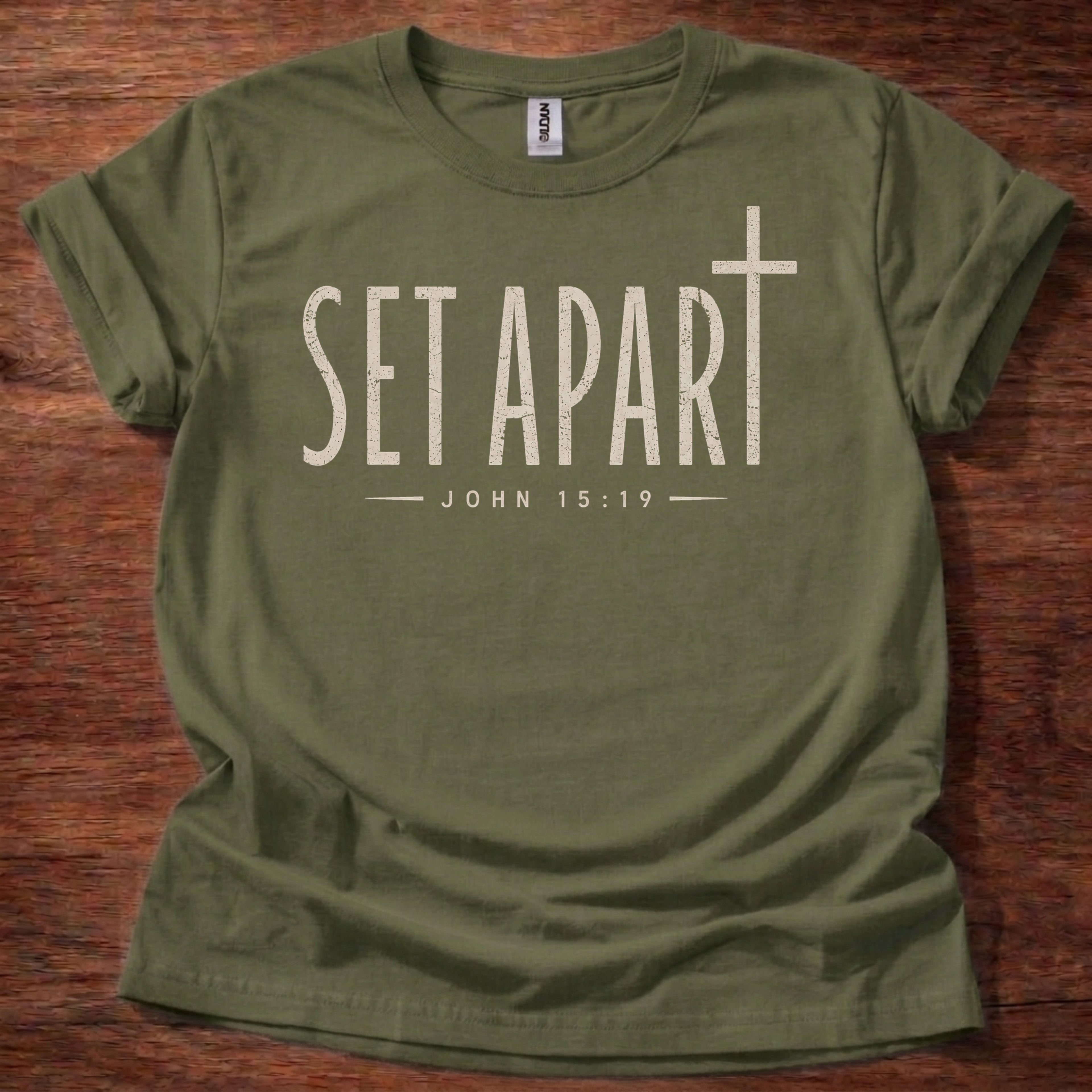 Military Green Set Apart Christian t-shirt with simple cross and John 15:19 scripture design