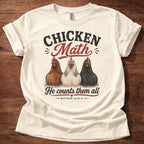 Natural Chicken Math He Counts Them All Christian chicken shirt with three hens graphic on beige t-shirt, Matthew 10:29-31 Bible verse design