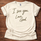 Natural Christian t-shirt with handwritten text reading I see you Love God