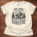 Natural Christian t-shirt with rustic mountain forest design and “I will dwell in the house of the Lord forever” Psalm 23:6 text