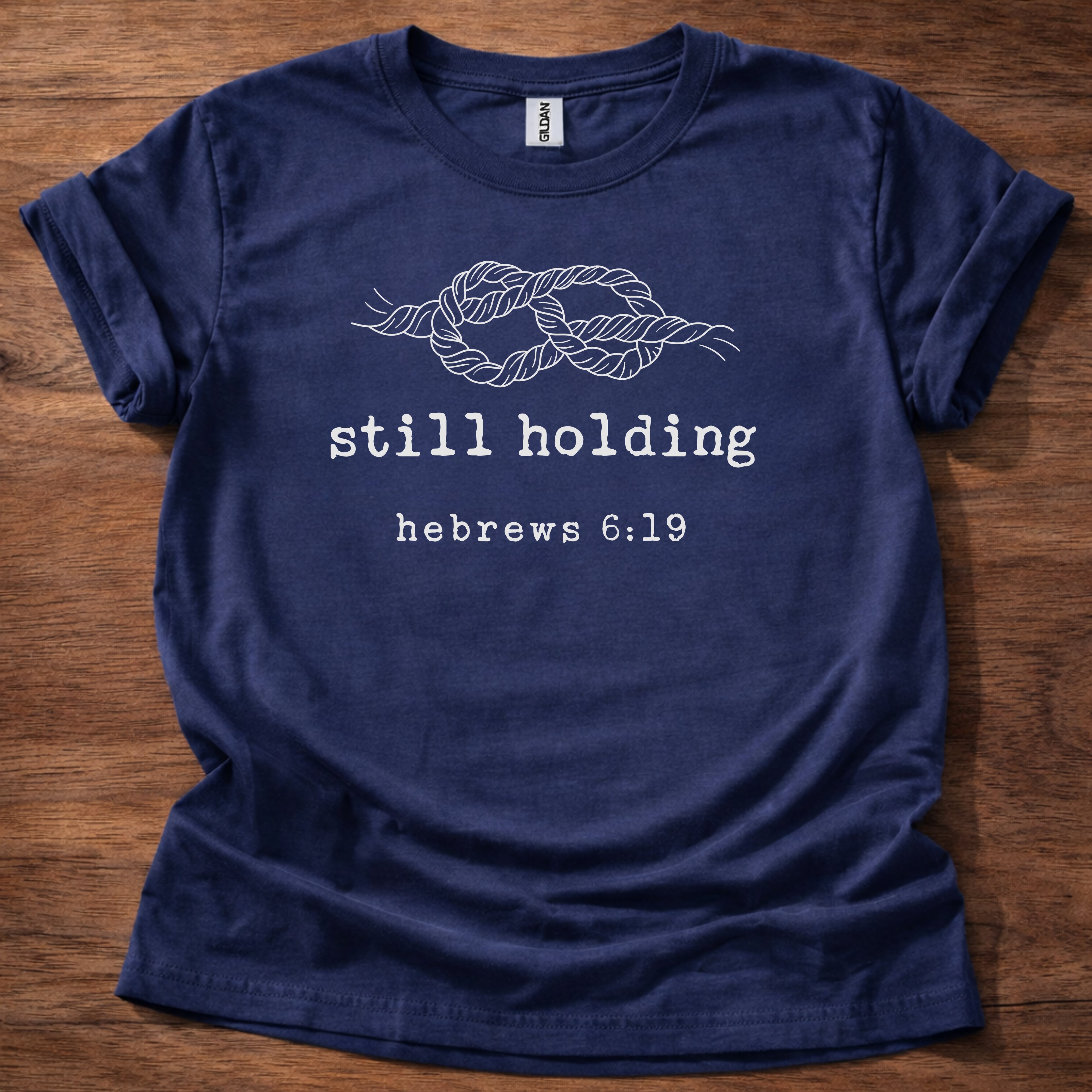 Still holding T-Shirt