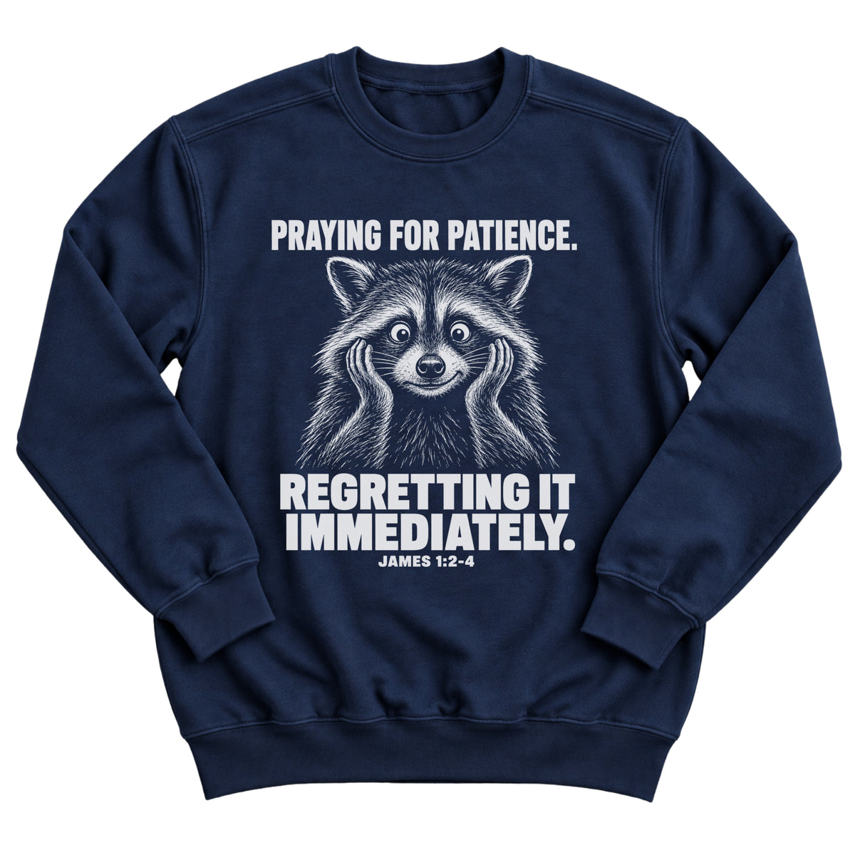 Navy crewneck sweatshirt with a startled raccoon with its paws on its cheeks and the words Praying For Patience. Regretting It Immediately. James 1:2-4