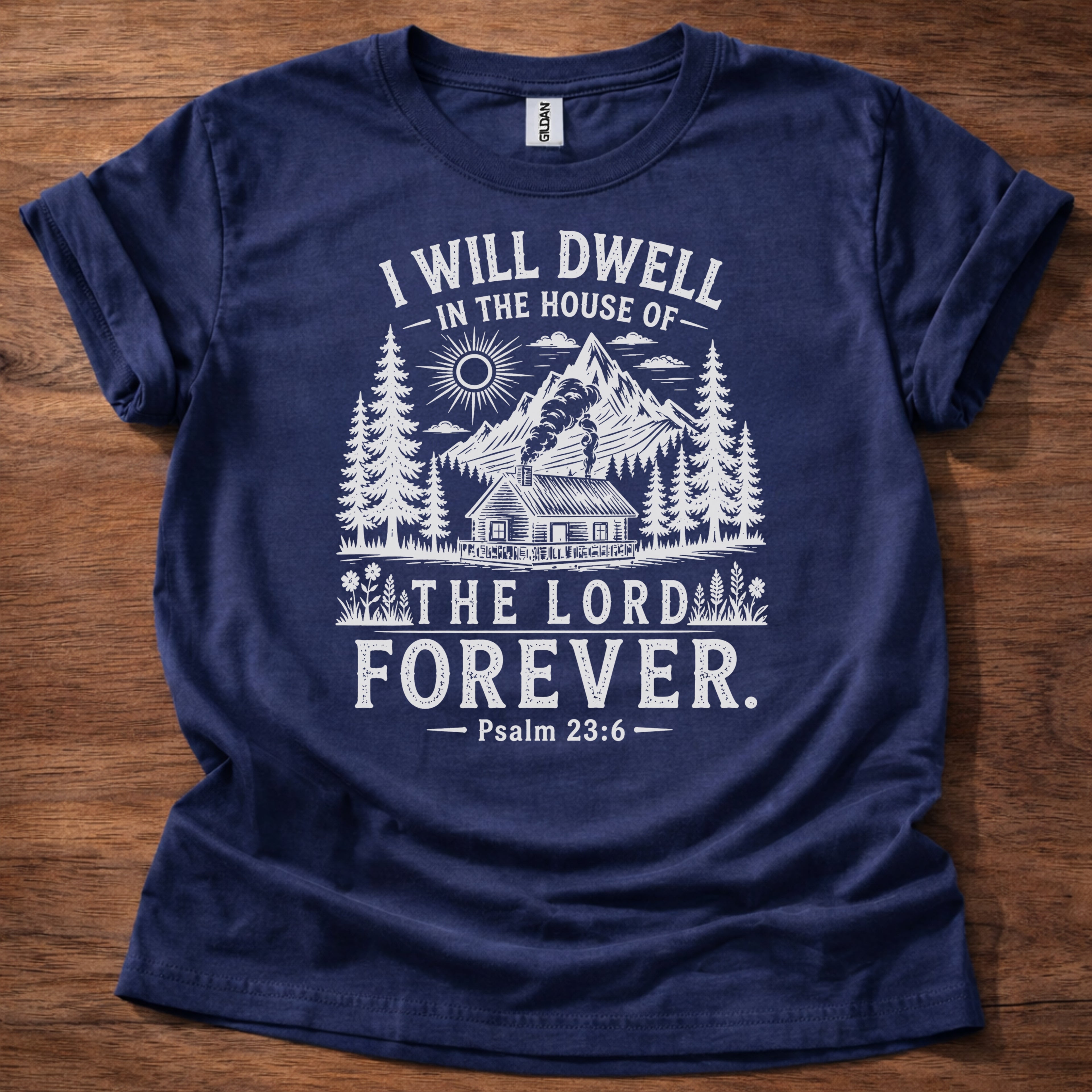Navy Christian t-shirt with rustic mountain forest design and “I will dwell in the house of the Lord forever” Psalm 23:6 text