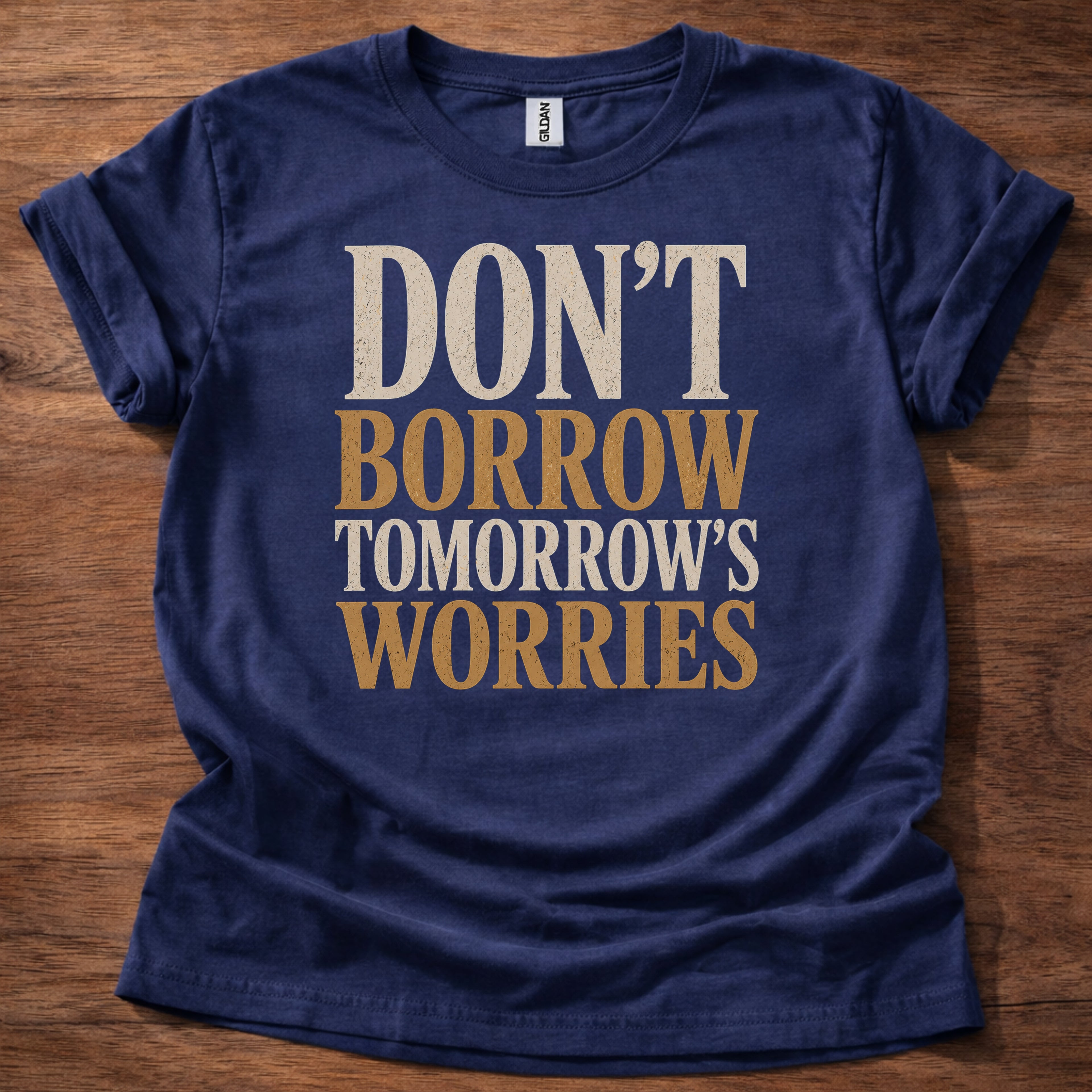 Navy Don’t Borrow Tomorrow’s Worries Christian shirt with bold vintage typography design on navy background, Matthew 6:34 inspired faith tee
