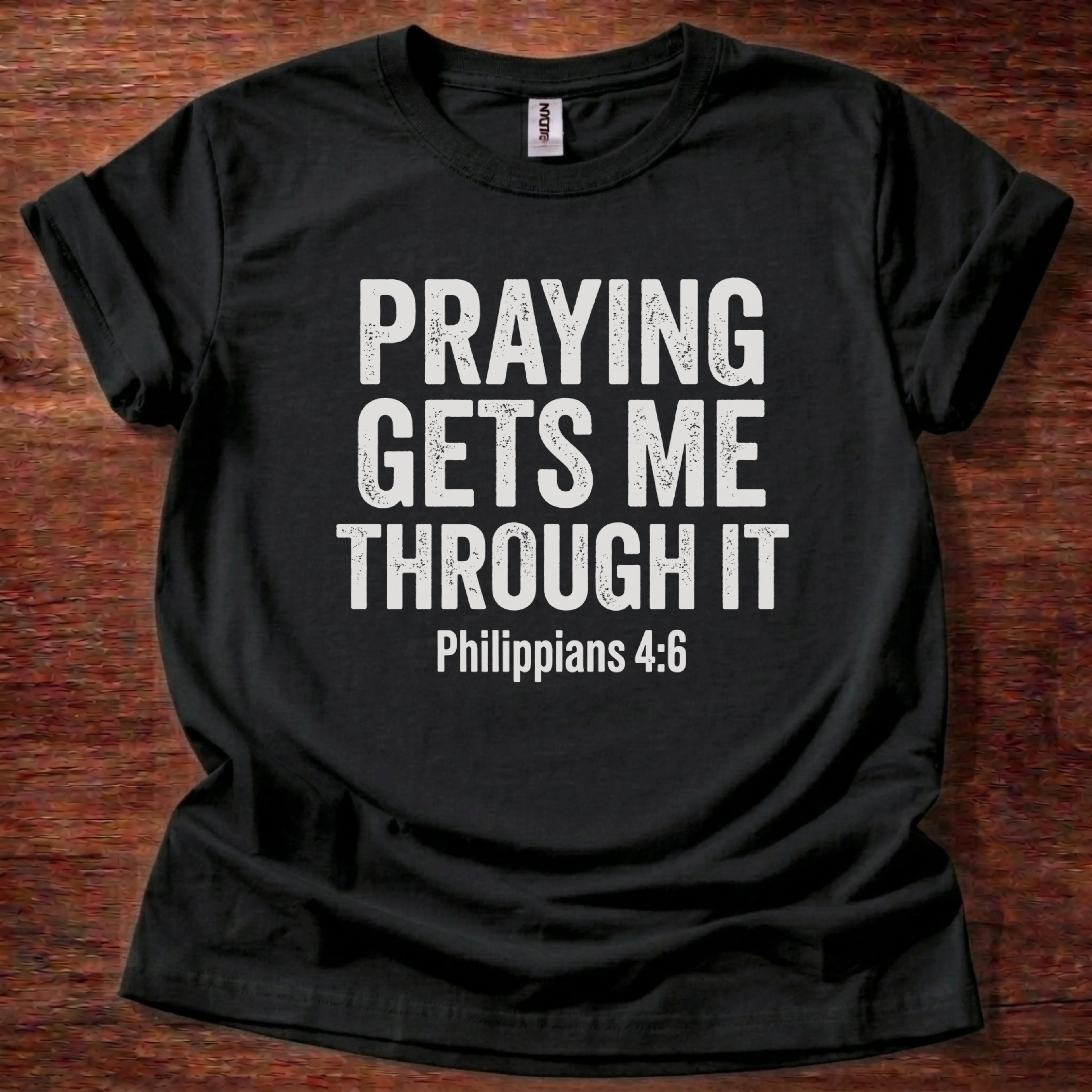 Praying Gets Me Throught it T-Shirt