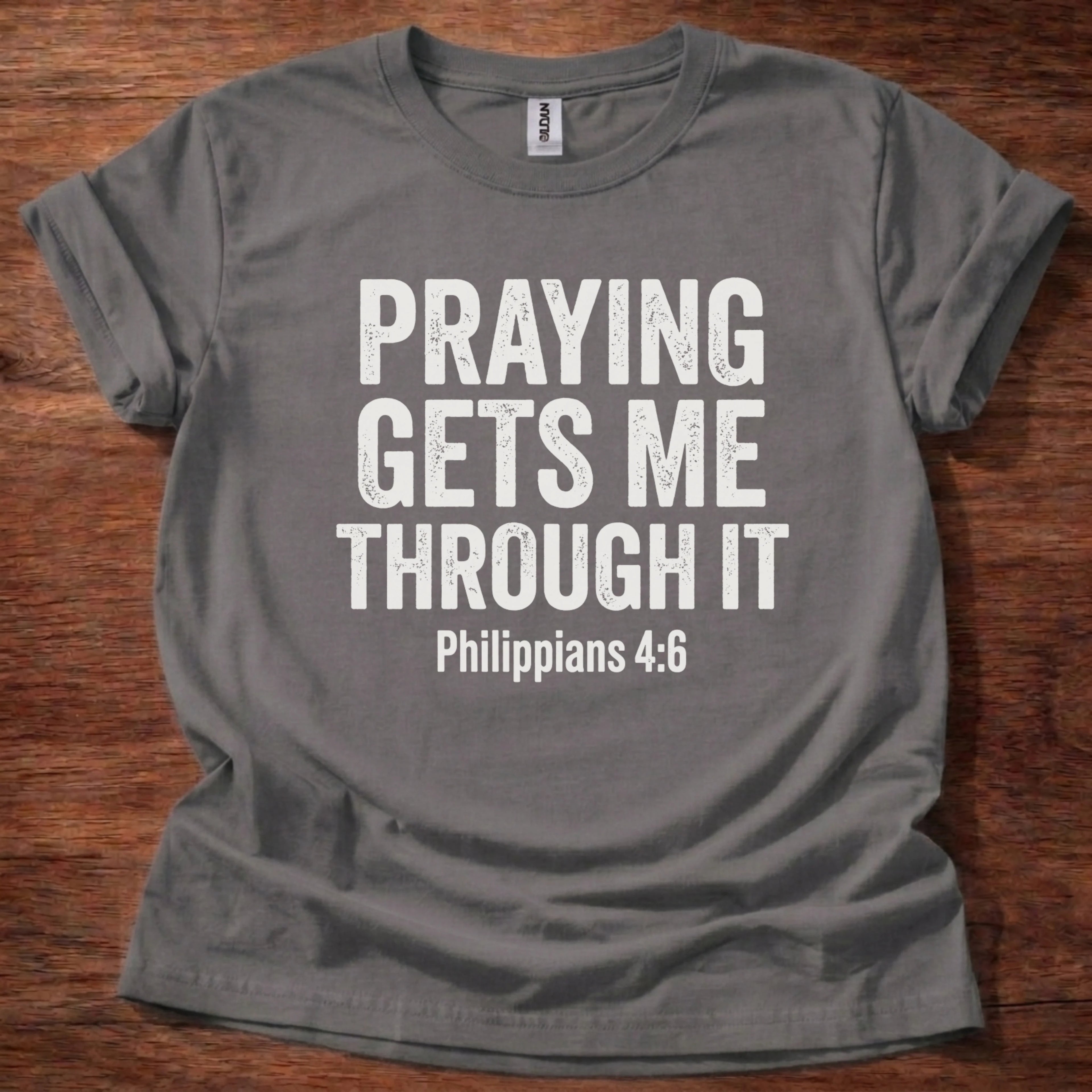 Praying Gets Me Throught it T-Shirt