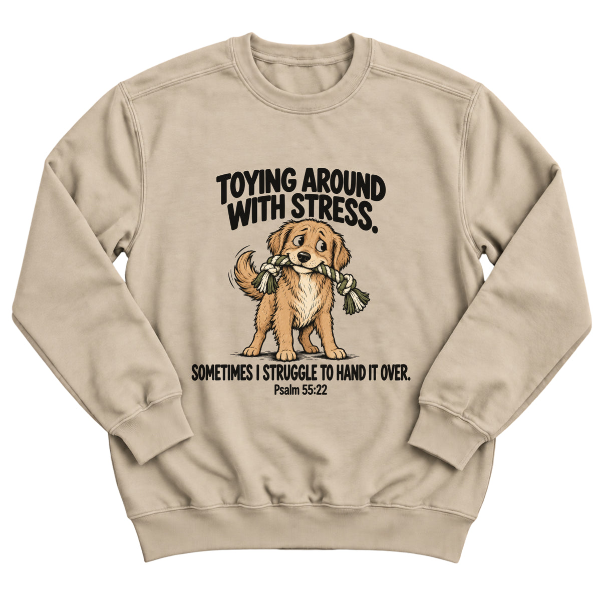 Sand crewneck sweatshirt with a golden retriever puppy tugging a rope toy with the words Toying Around With Stress. Sometimes I Struggle To Hand It Over. Psalm 55:22