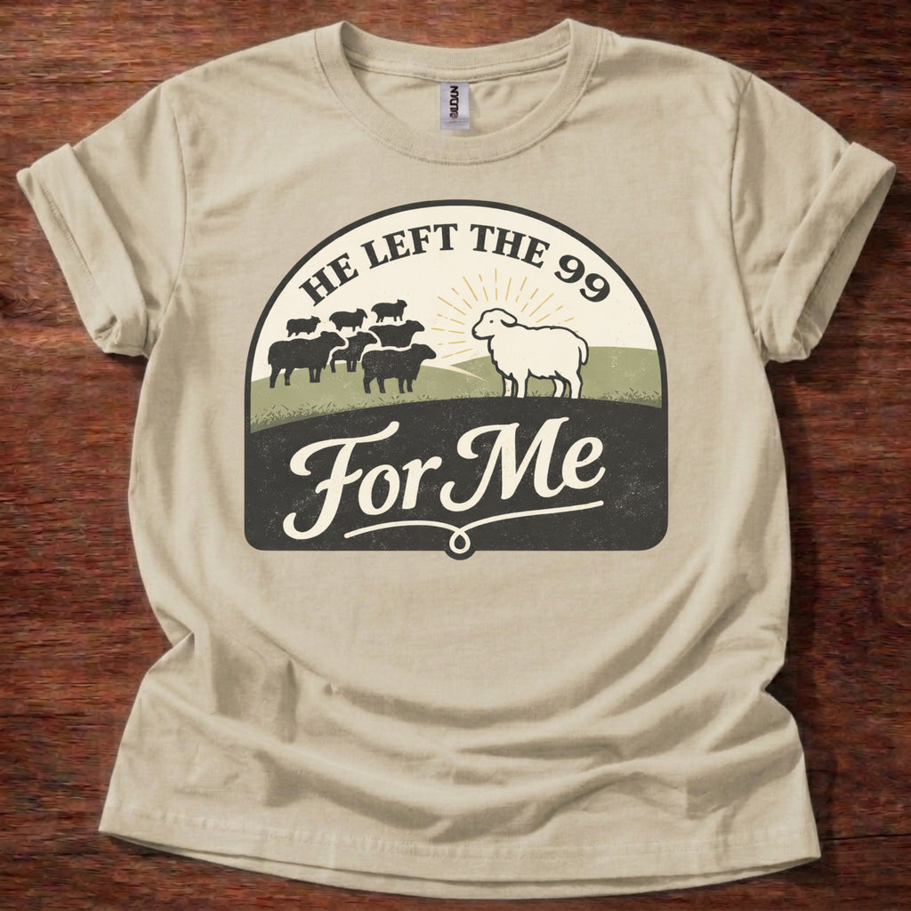Beige t-shirt with graphic design featuring sheep on a wooden surface