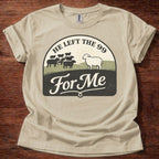 Beige t-shirt with graphic design featuring sheep on a wooden surface