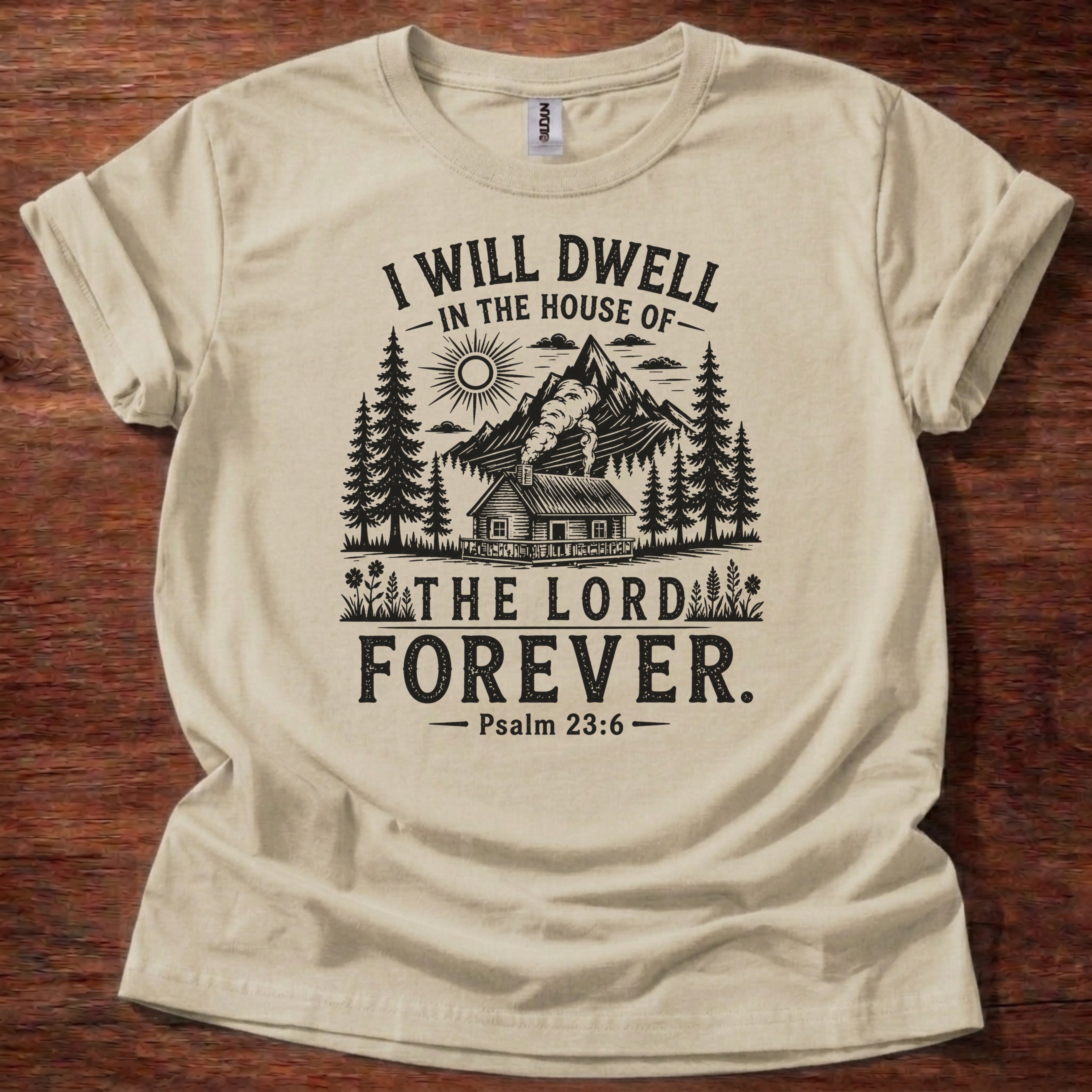 Sand Christian t-shirt with rustic mountain forest design and “I will dwell in the house of the Lord forever” Psalm 23:6 text