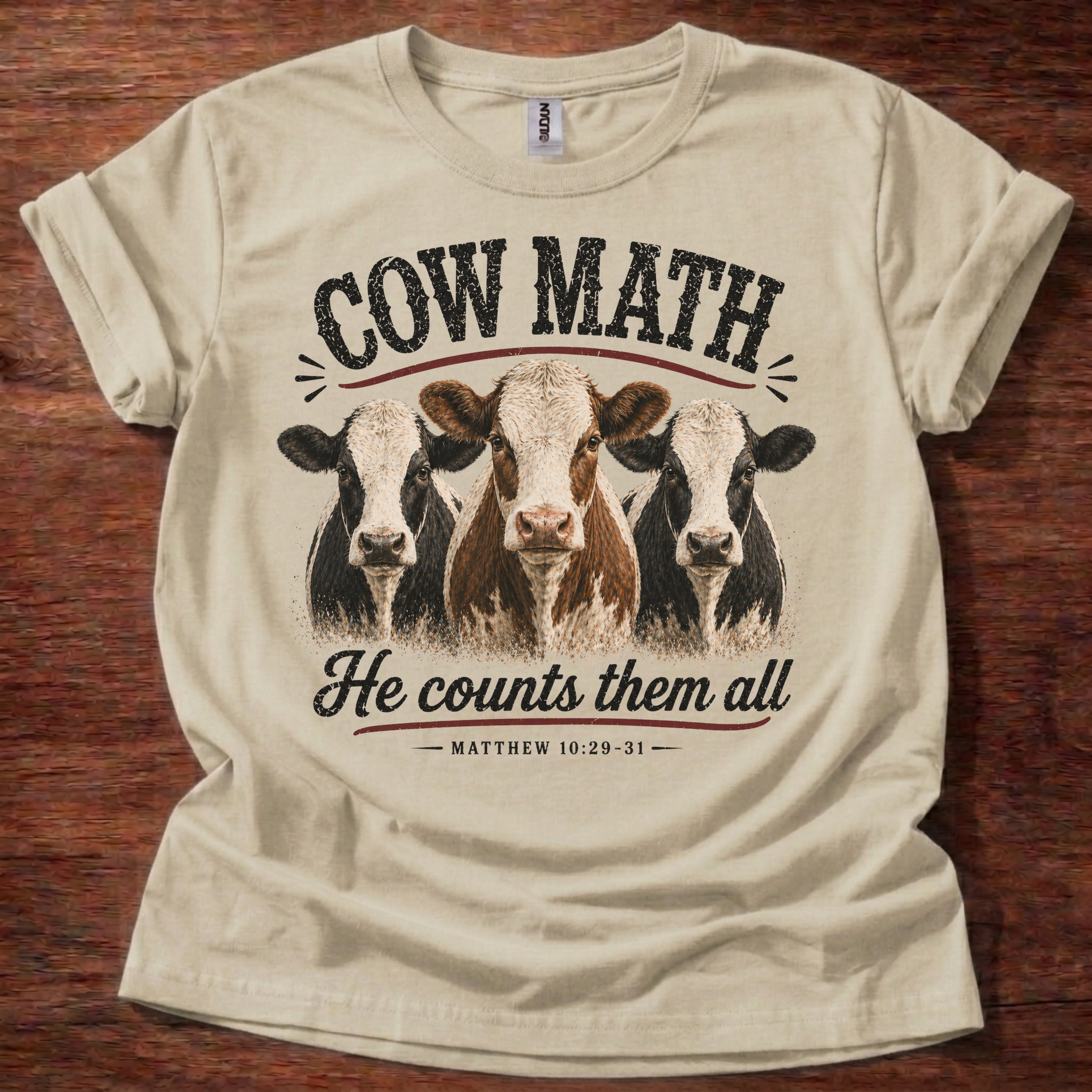 Sand Cow Math He Counts Them All Christian cow shirt with three cows graphic on white t-shirt, Matthew 10:29-31 Bible verse design