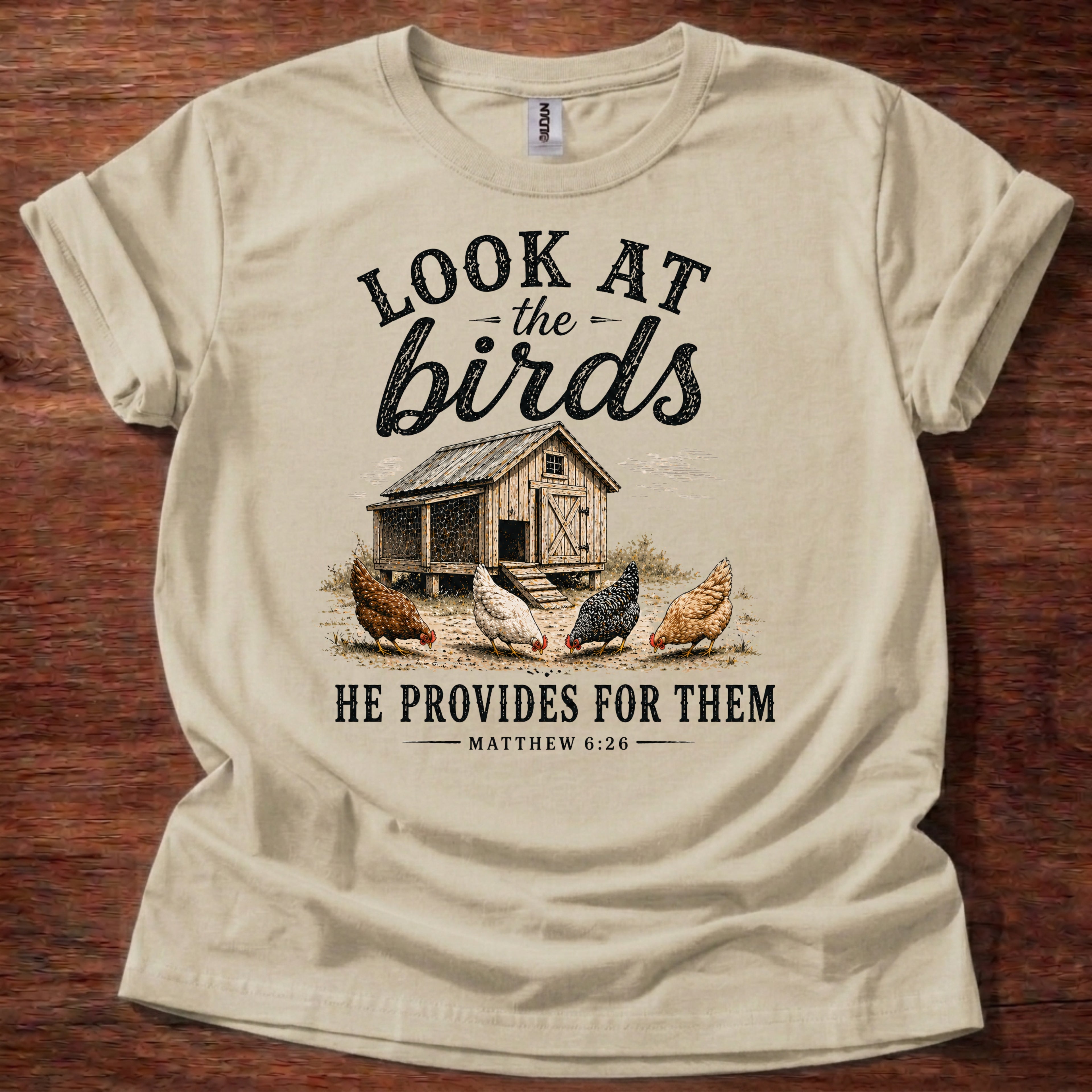 Sand Look at the Birds He Provides for Them Christian chicken shirt with rustic chicken coop graphic on beige t-shirt, Matthew 6:26 Bible verse design