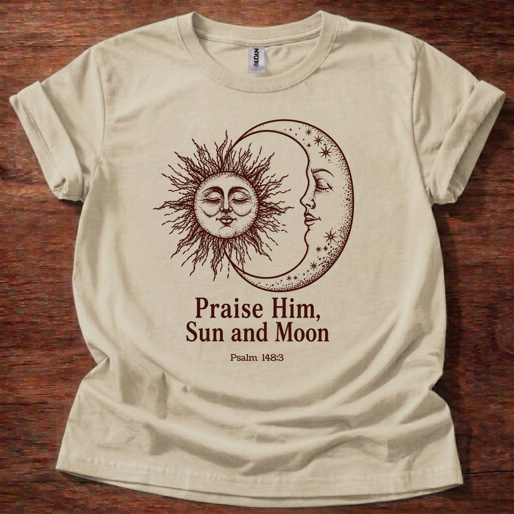 Sand t-shirt featuring a sun and moon celestial design with the text “Praise Him, Sun and Moon Psalm 148:3” printed on the front