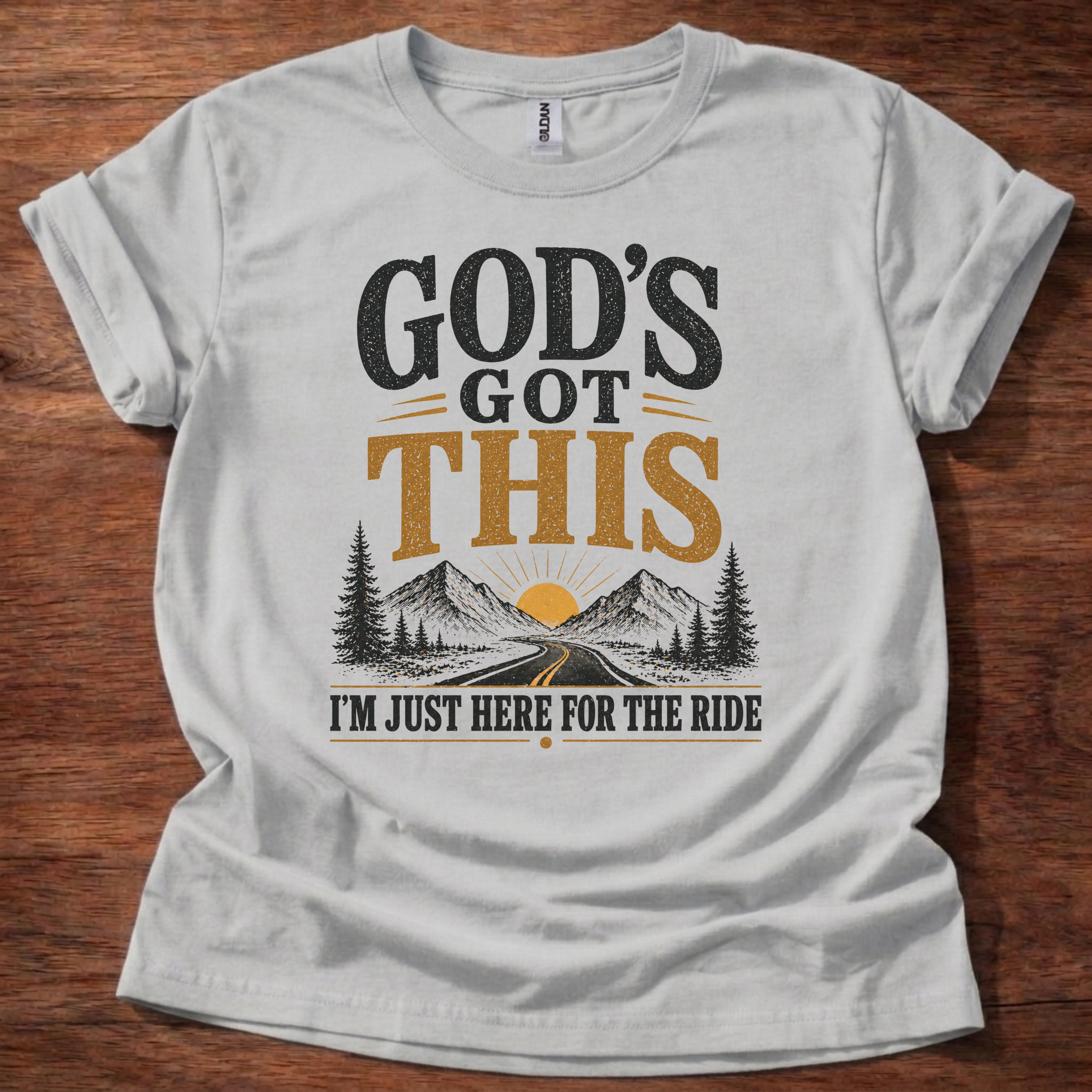 Sport Grey God’s Got This I’m Just Here for the Ride Christian shirt with mountain and sunrise graphic on beige t-shirt, inspirational faith design