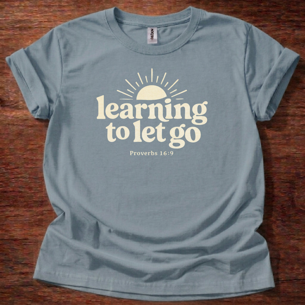 Learning to let go T-Shirt