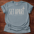 Stone Blue Set Apart Christian t-shirt with simple cross and John 15:19 scripture design