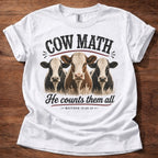 White Cow Math He Counts Them All Christian cow shirt with three cows graphic on white t-shirt, Matthew 10:29-31 Bible verse design