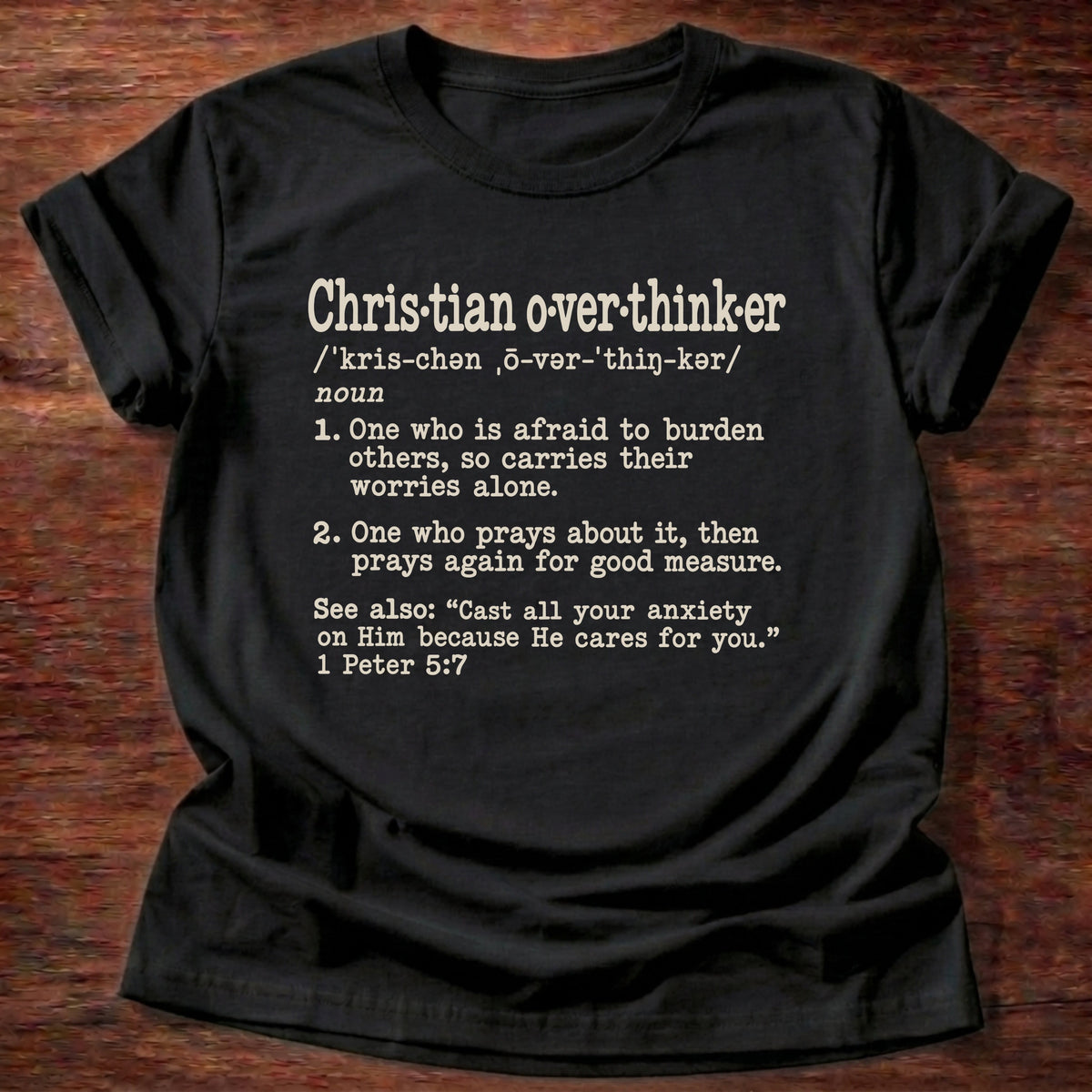 Christian Overthinker T-Shirt in Black featuring Christian Overthinker dictionary definition typewriter design with 1 Peter 5:7 cast all your anxiety on Him