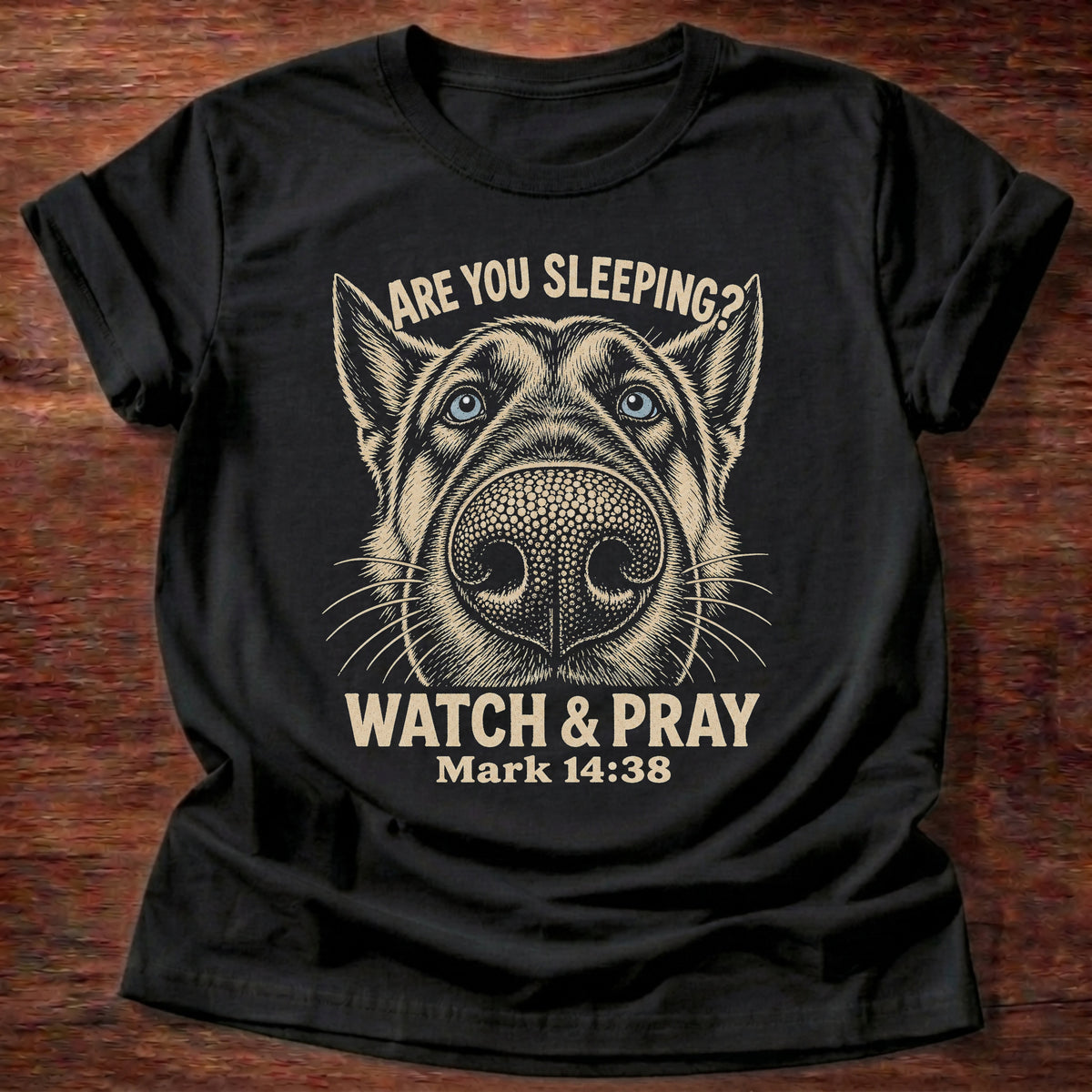Black t-shirt printed with a close-up side-eyeing dog face graphic and “Are you sleeping? Watch & pray.” Mark 14:38 Christian shirt