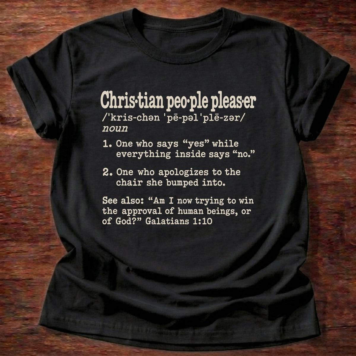 Christian People Pleaser T-Shirt in Black featuring Christian People Pleaser dictionary definition typewriter design with Galatians 1:10 approval of God