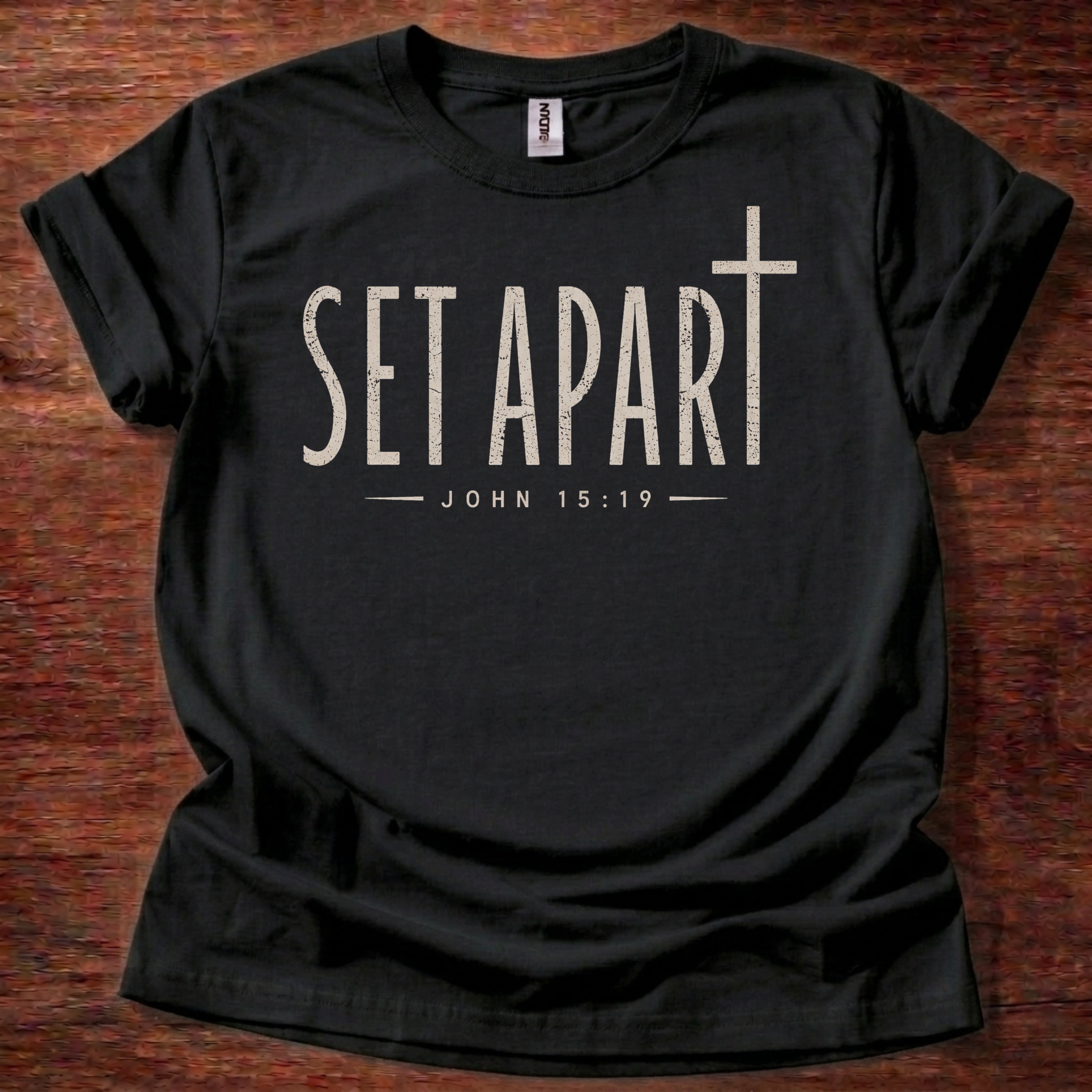 black Set Apart Christian t-shirt with simple cross and John 15:19 scripture design
