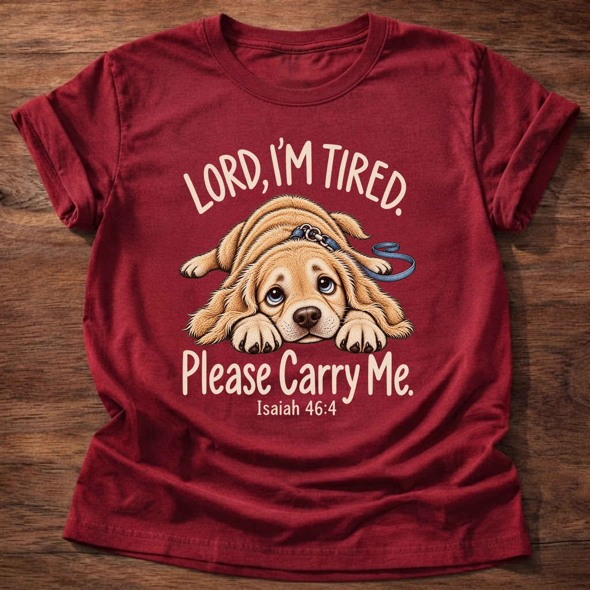 Cherry Red t-shirt printed with a tired puppy lying flat on the floor graphic and “Lord, I'm tired. Please carry me.” Isaiah 46:4 Christian shirt