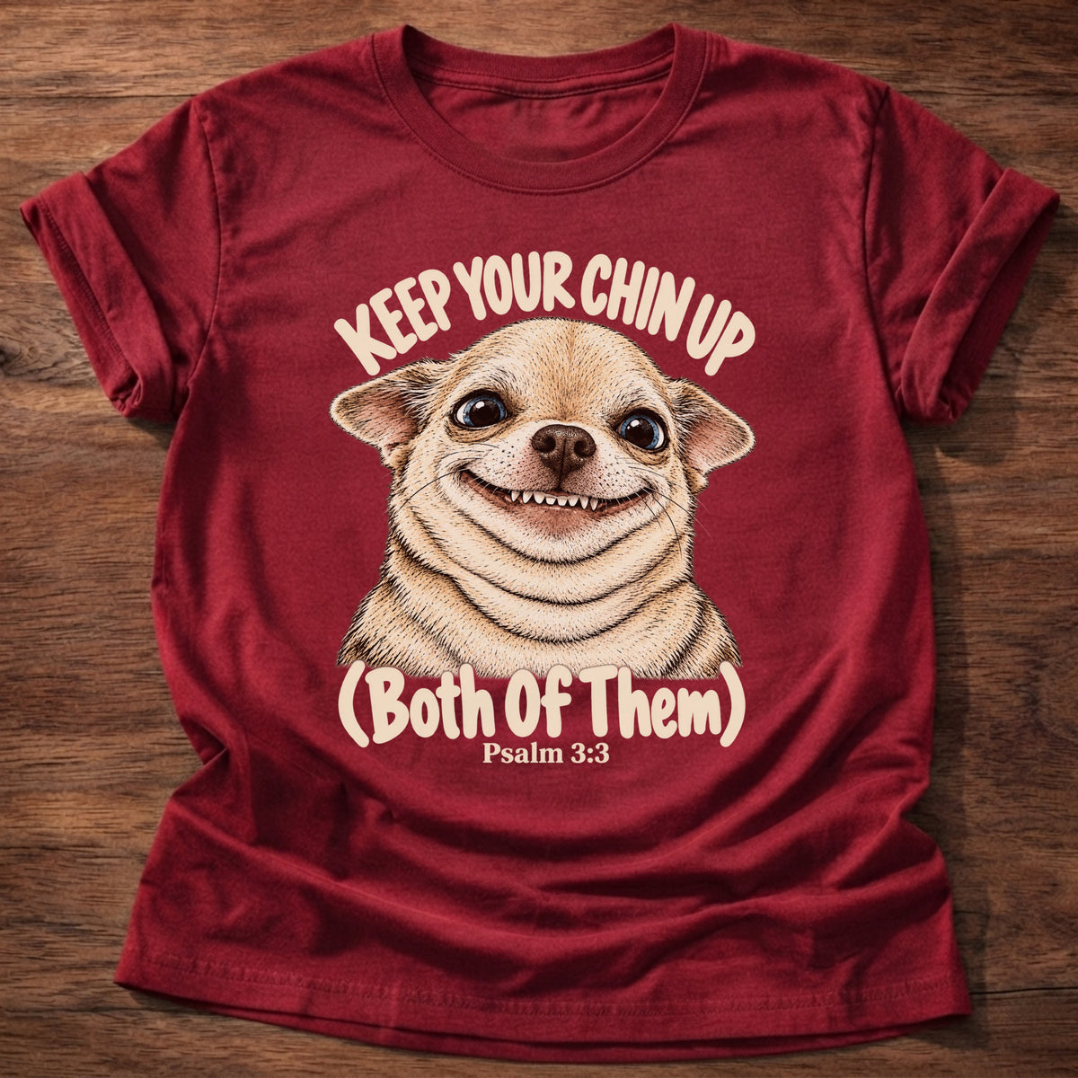 Cherry Red t-shirt printed with a grinning fluffy chihuahua graphic and “Keep your chin up. (Both of them.)” Psalm 3:3 Christian shirt