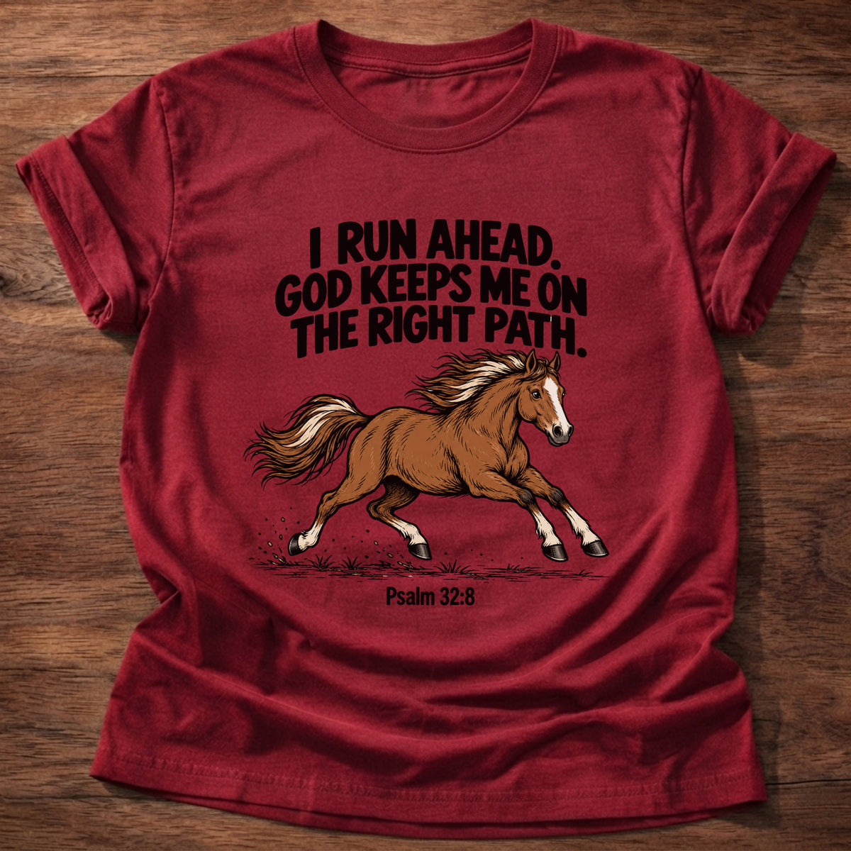 Cherry Red t-shirt printed with a running horse graphic and 'I run ahead. God keeps me on the right path.' Psalm 32:8 faith based gift