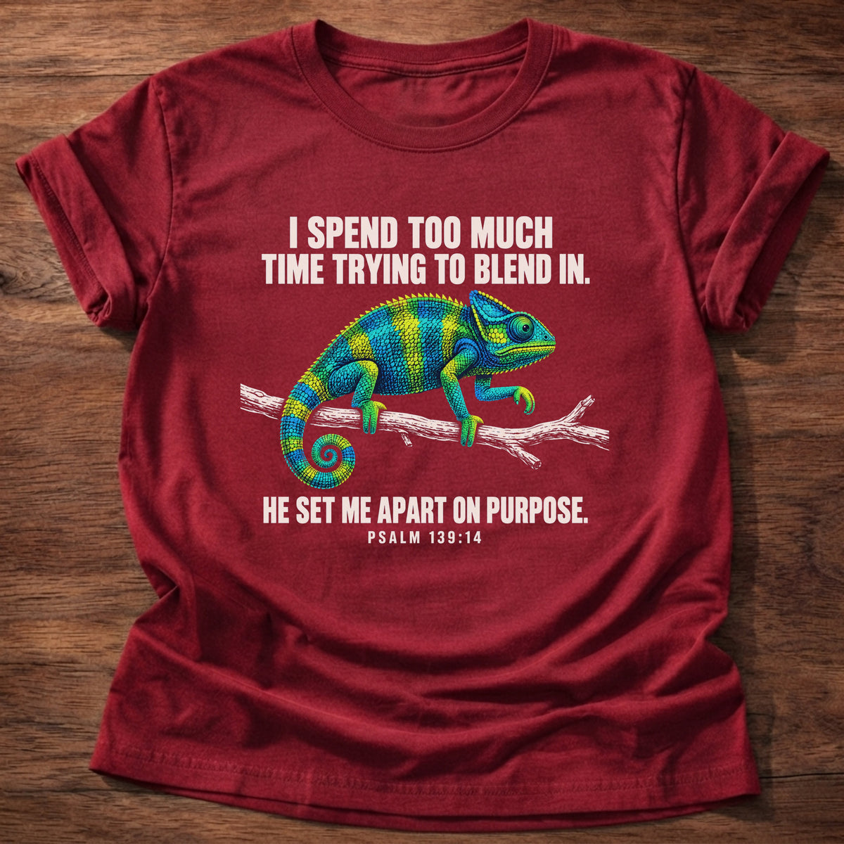 Cherry Red t-shirt printed with a chameleon blending into a branch graphic and 'I spend too much time trying to blend in. He set me apart on purpose.' Psalm 139:14 faith based gift