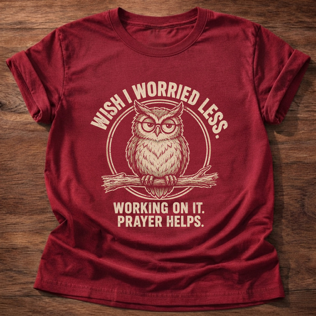 Cherry Red t-shirt printed with a worried owl graphic and 'Wish I worried less. Working on it. Prayer helps.' 1 Peter 5:7 faith based gift