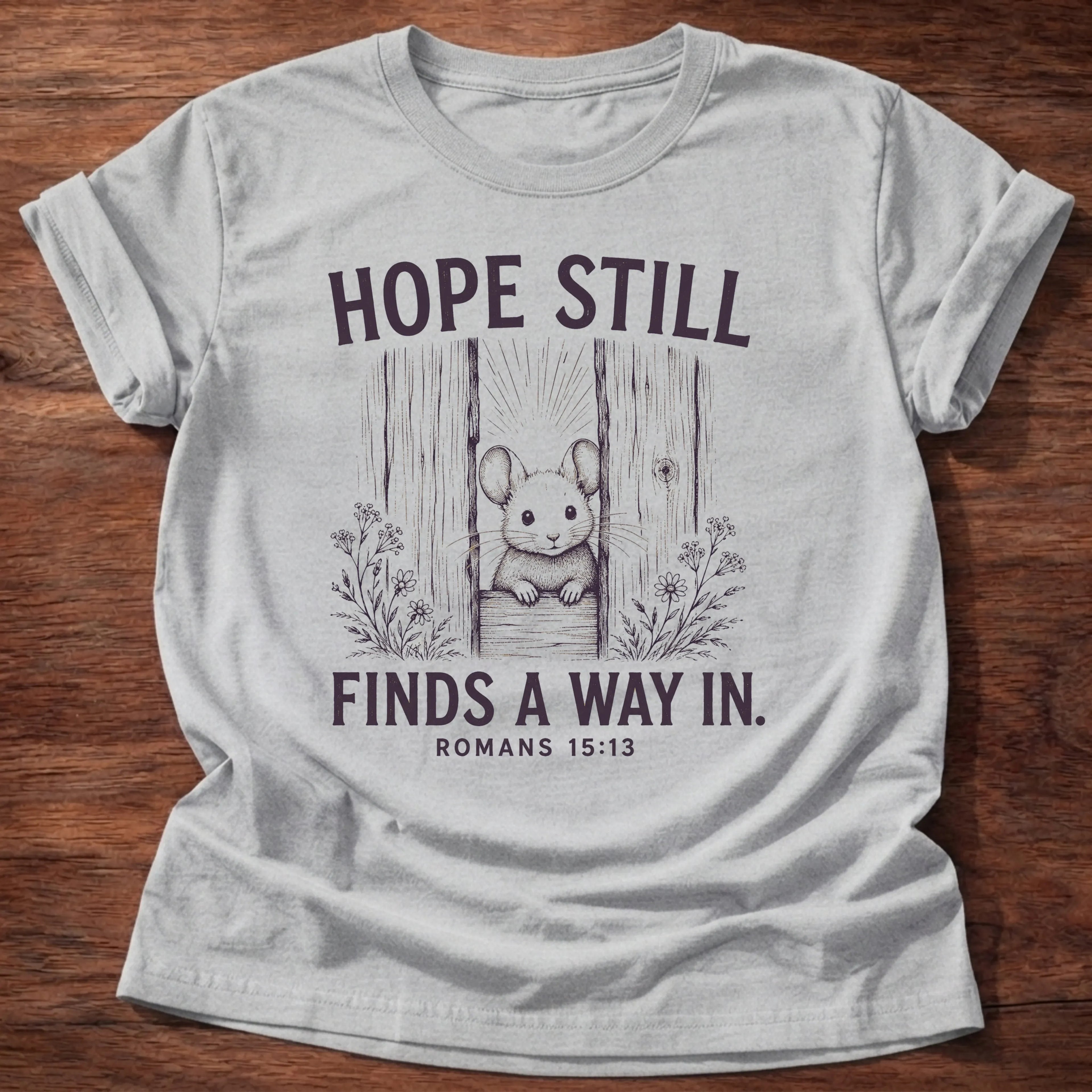 Sport Grey Gildan 64000 t-shirt with a bunny illustration and 'Hope Still Finds A Way In' text, Romans 15:13 Christian t-shirt