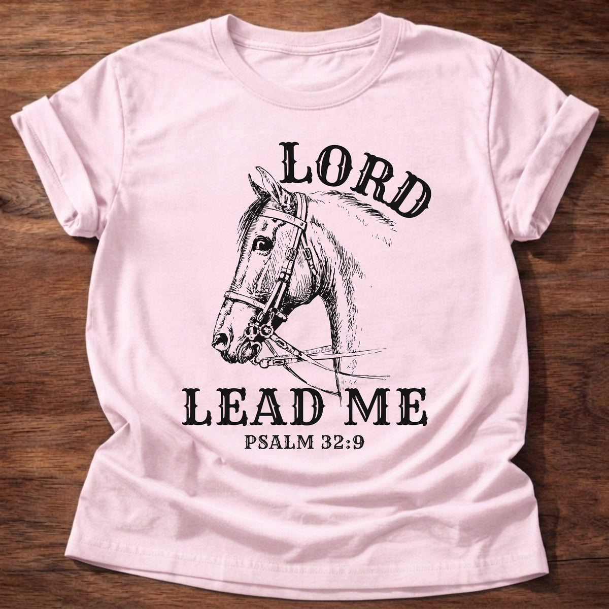 Light Pink t-shirt printed with a hand-sketched horse wearing a bridle and “Lord, Lead Me” Psalm 32:9 Christian shirt