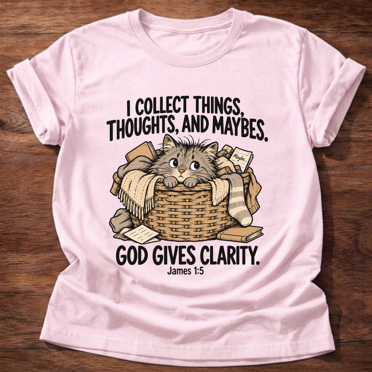 Light Pink t-shirt printed with a squirrel and a pile of collected items graphic and 'I collect worries instead of trust. But God provides.' Matthew 6:25-26 faith based gift